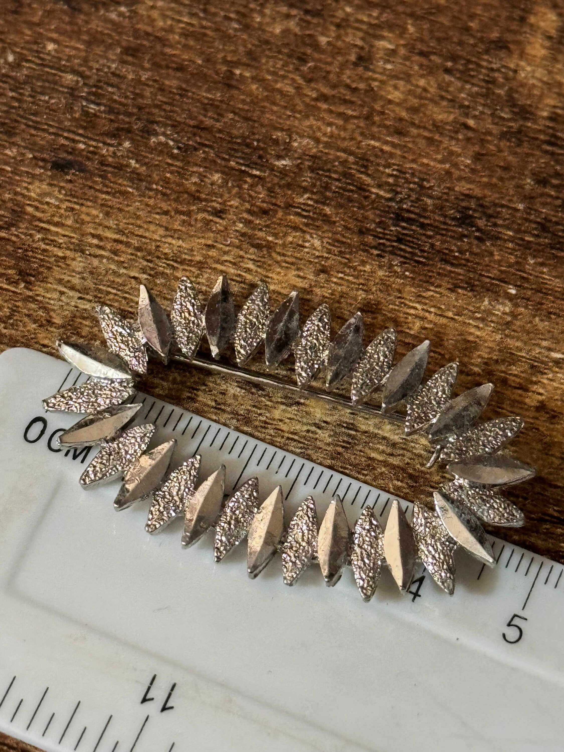 silver abstract oval brutalist brooch, vintage 1970s