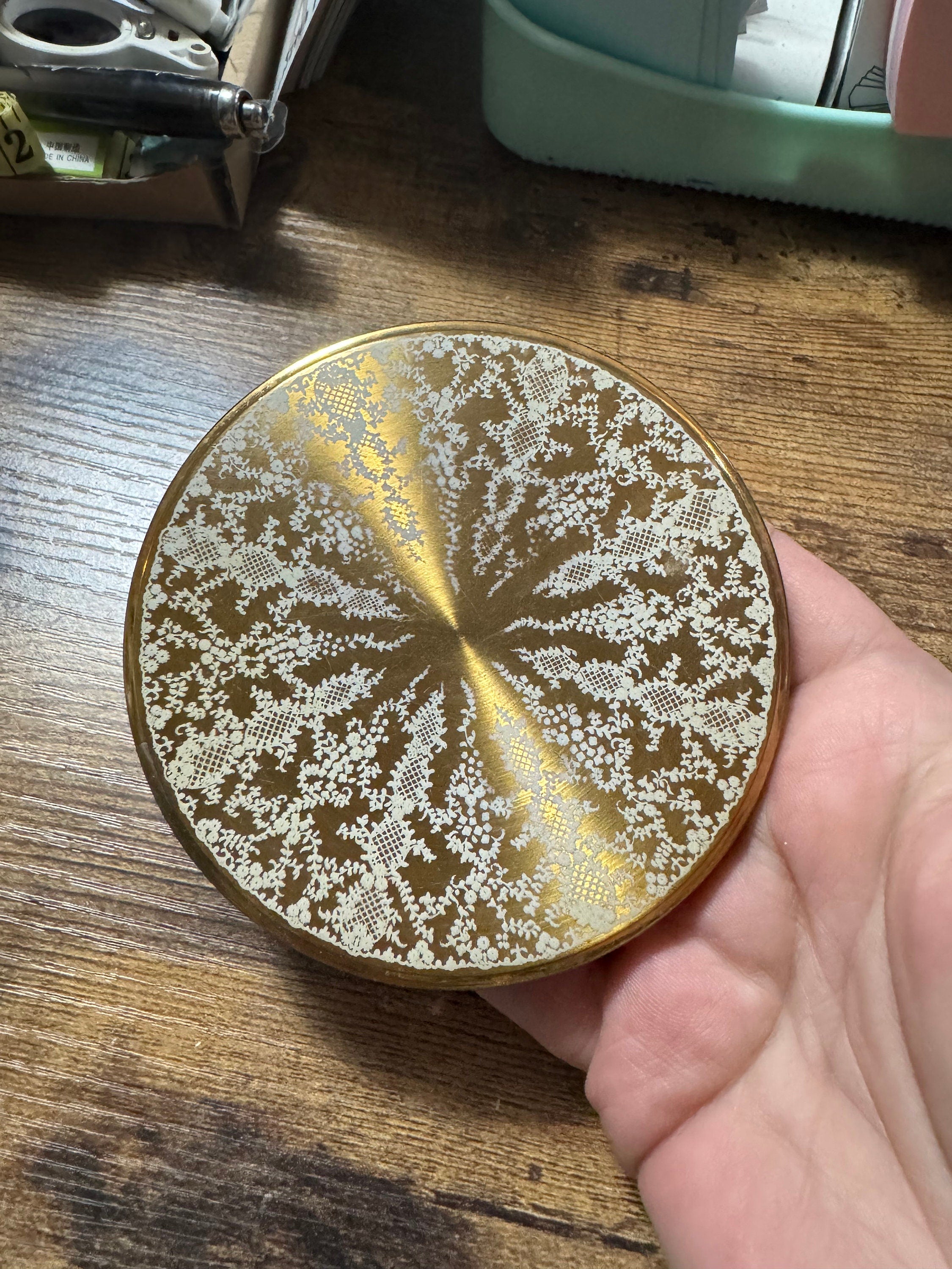 Oversized gold tone giant powder compact white lace design