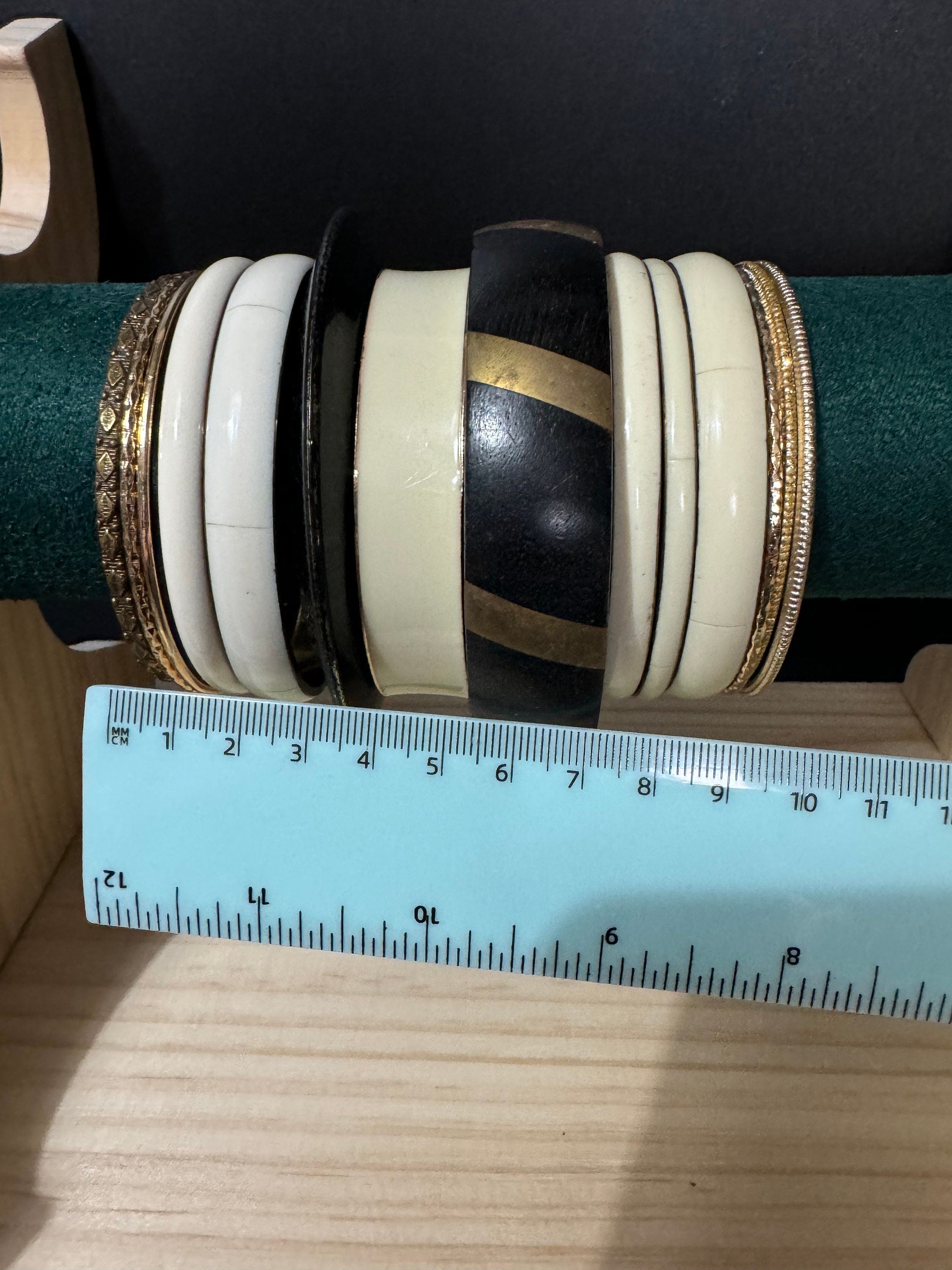 Armful of vintage cream black and gold tones slim and wide tacking boho bangles