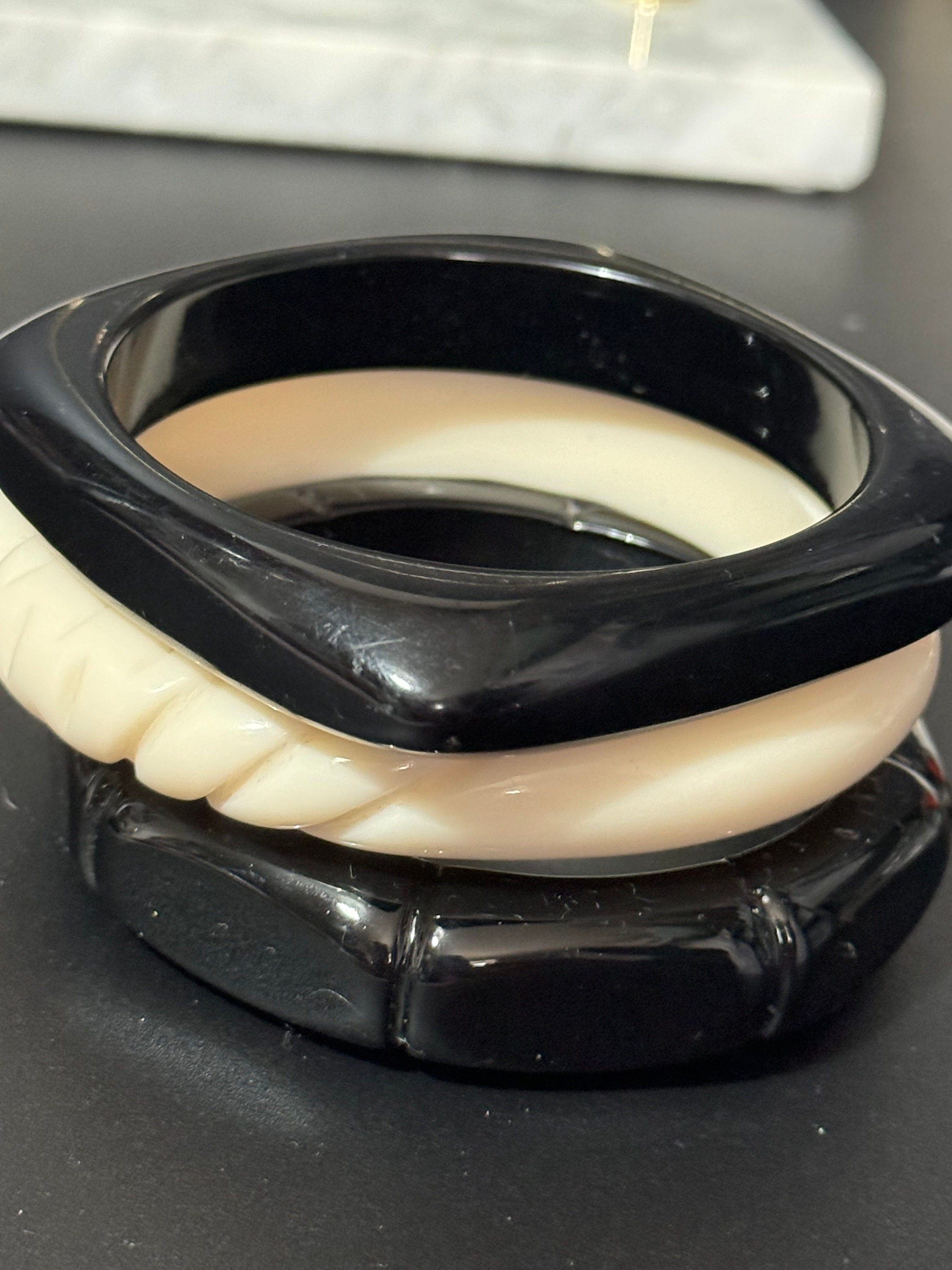 Vintage stack of black and cream Chunky stylish plastic bangles retro acrylic bracelets