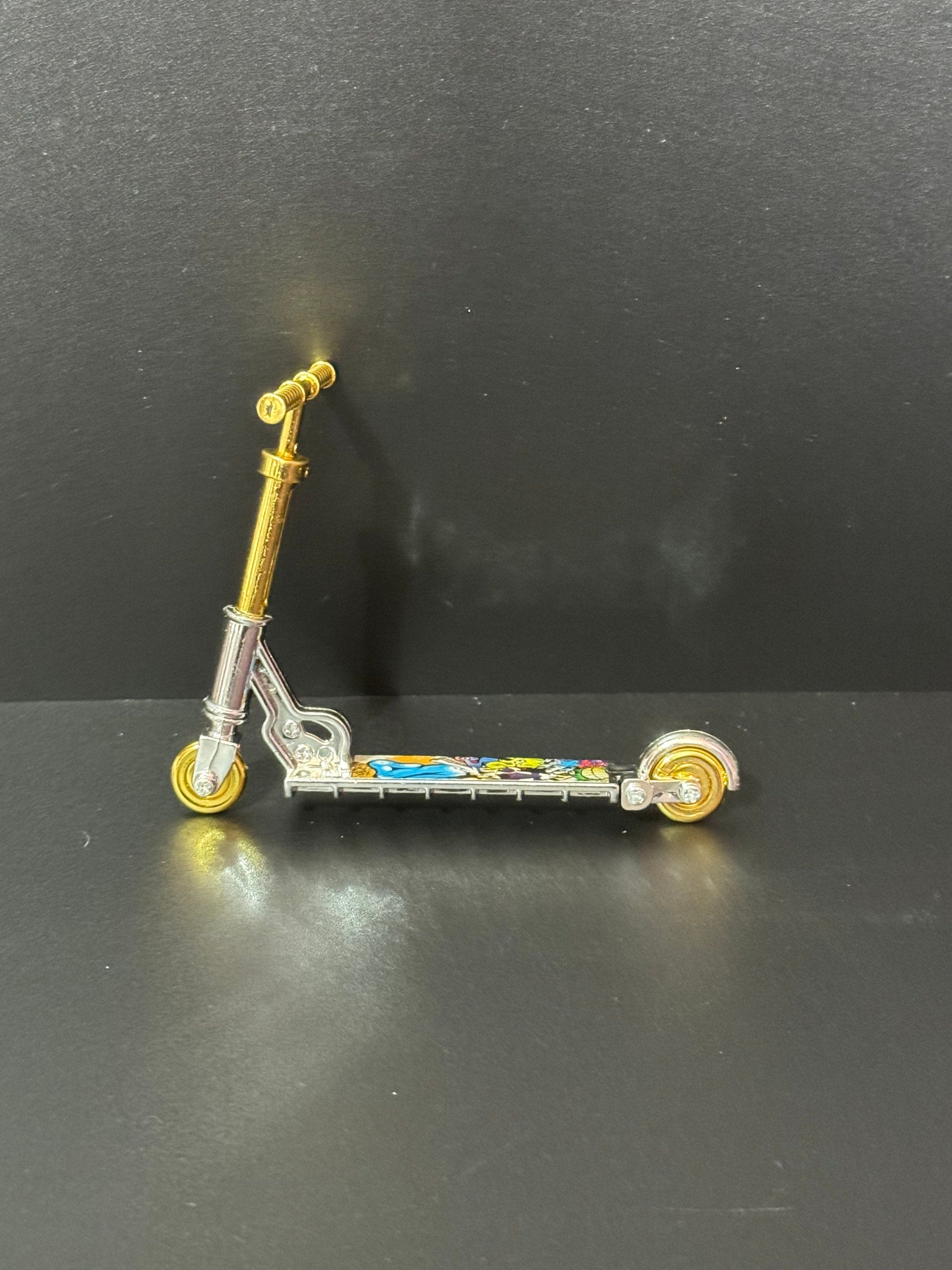 Miniature Gold and silver scooter cake topper decoration plastic finger operated sports