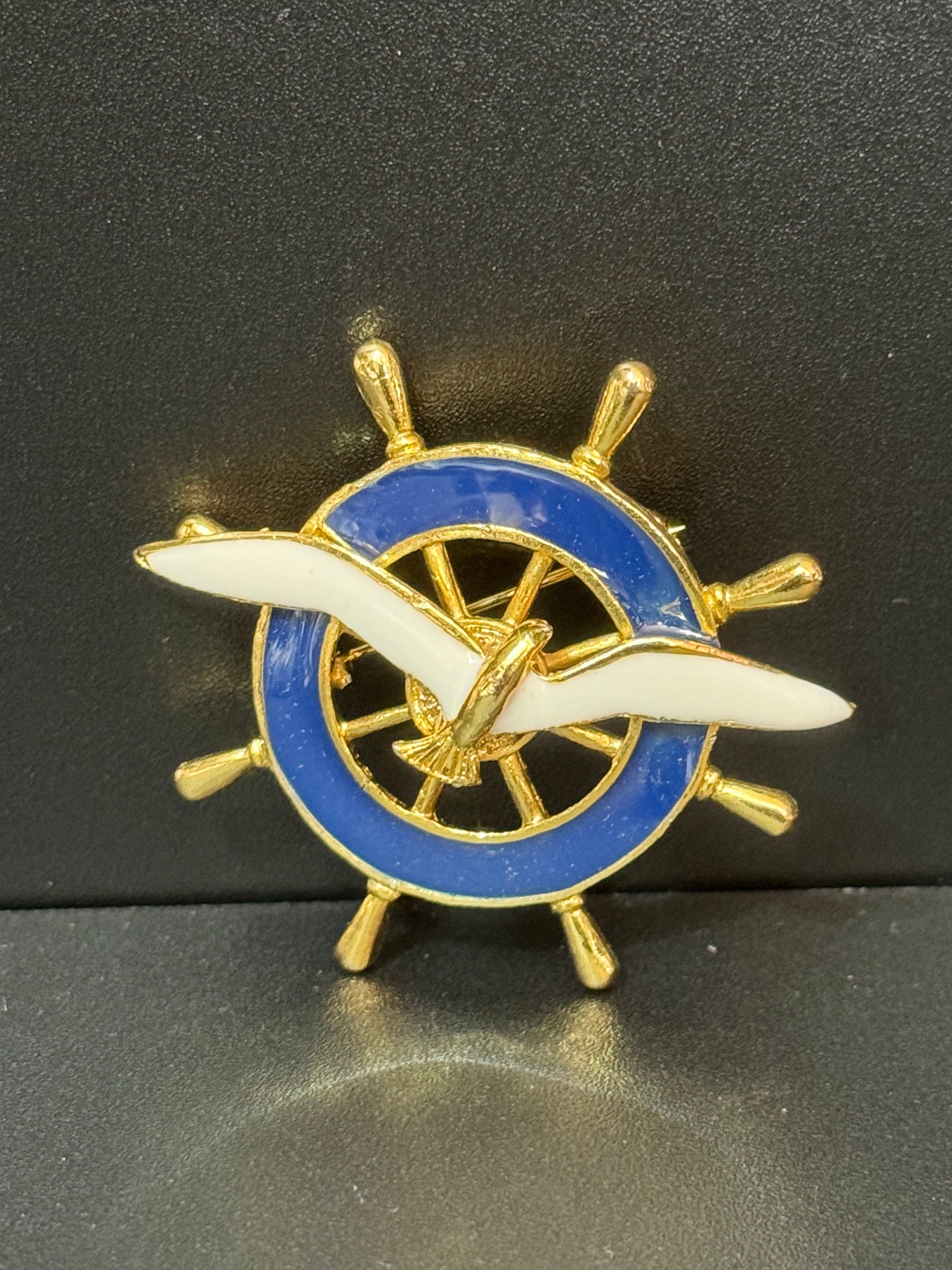 Vintage ships wheel Nautical Brooch, blue enamel with a seagull