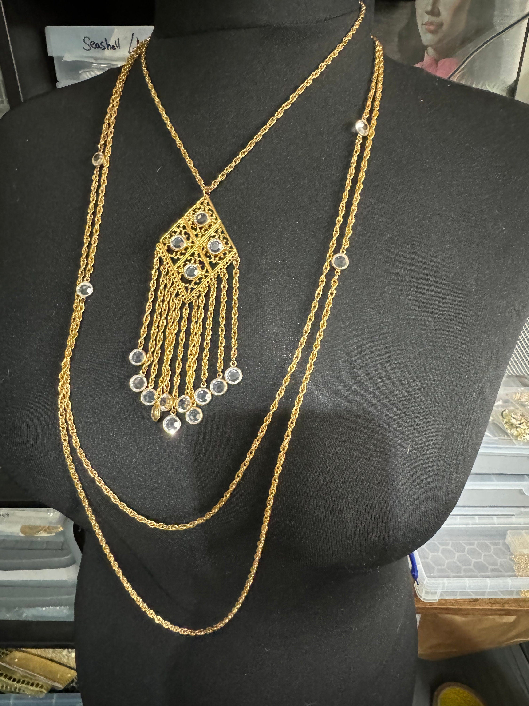 Signed Goldette vintage 1970s Rivière bezel set clear glass Crystal gold tone multi strand 3 row chain pendant necklace