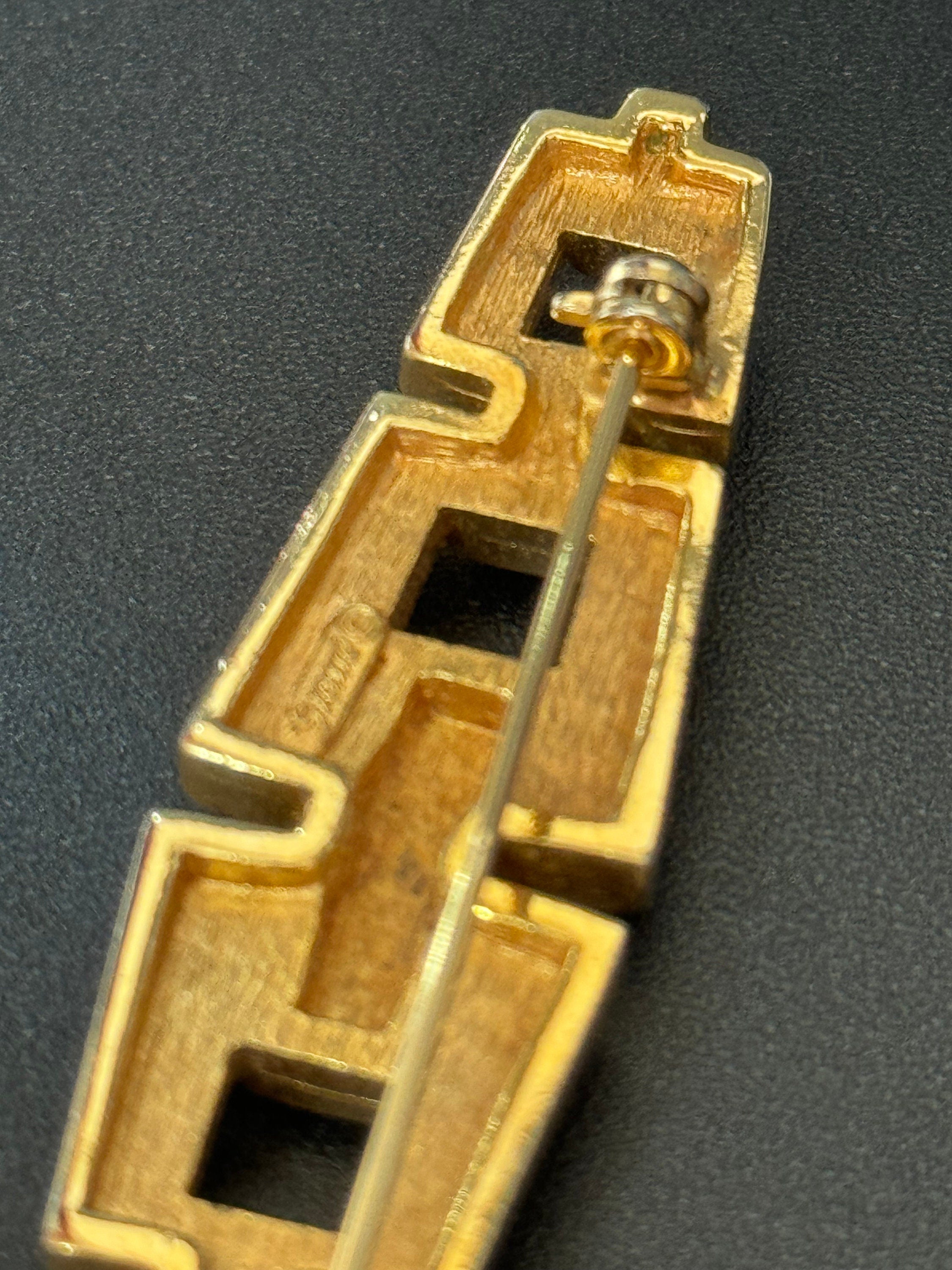 Signed GROSSE German Designer rhinestone Gold Tone modernist high end bar brooch with roll clasp