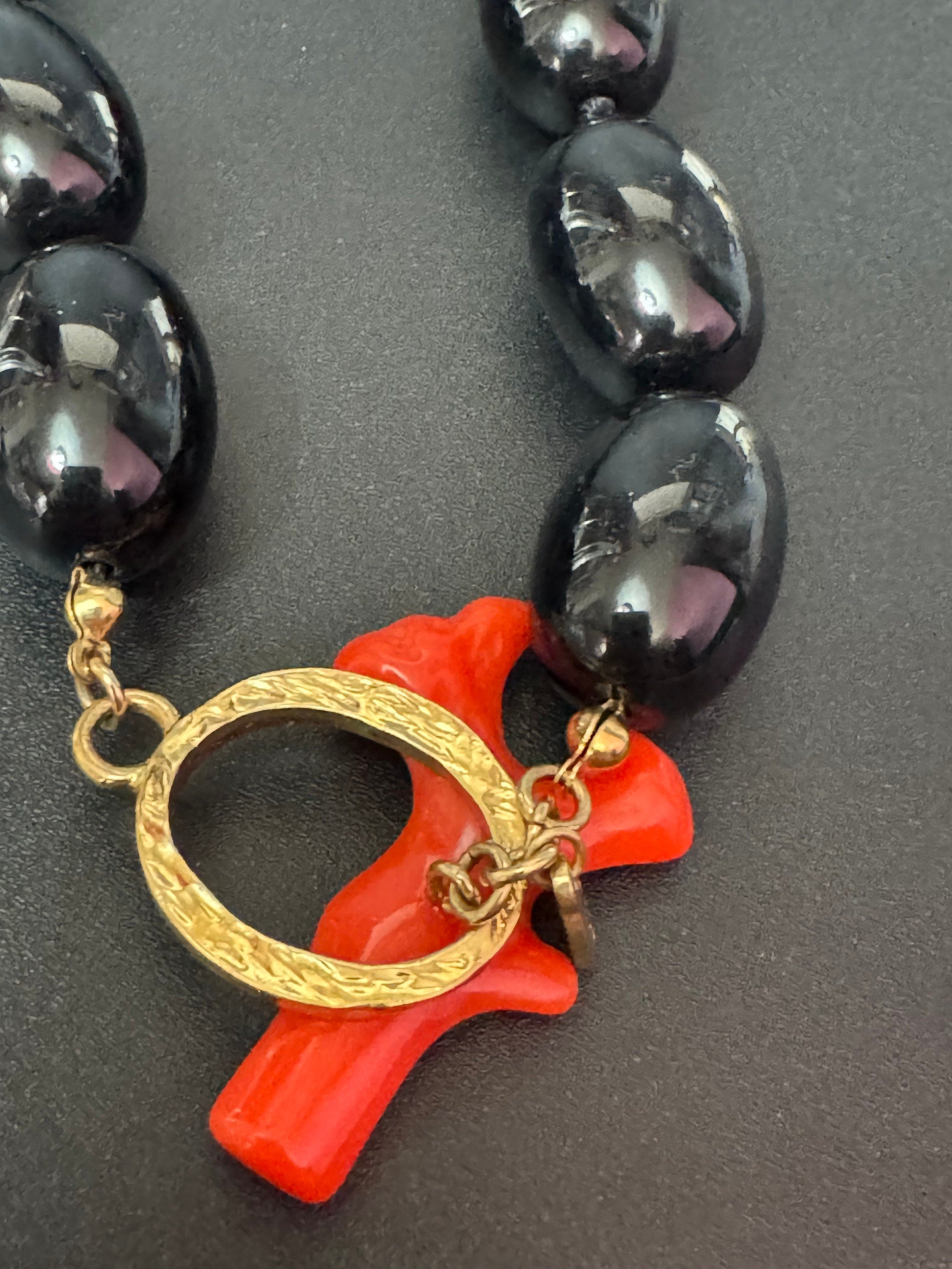 Signed KJL faux coral and black plastic beaded chunky long necklace Kenneth jay lane