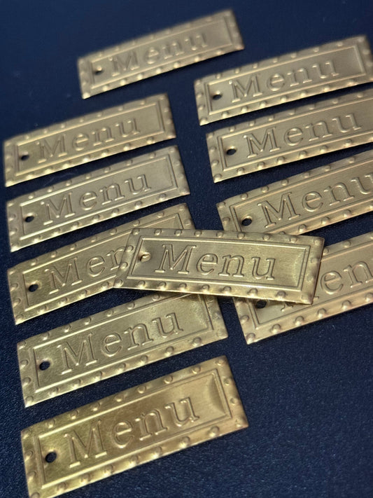 Set of 11 vintage stamped brass French menu labels