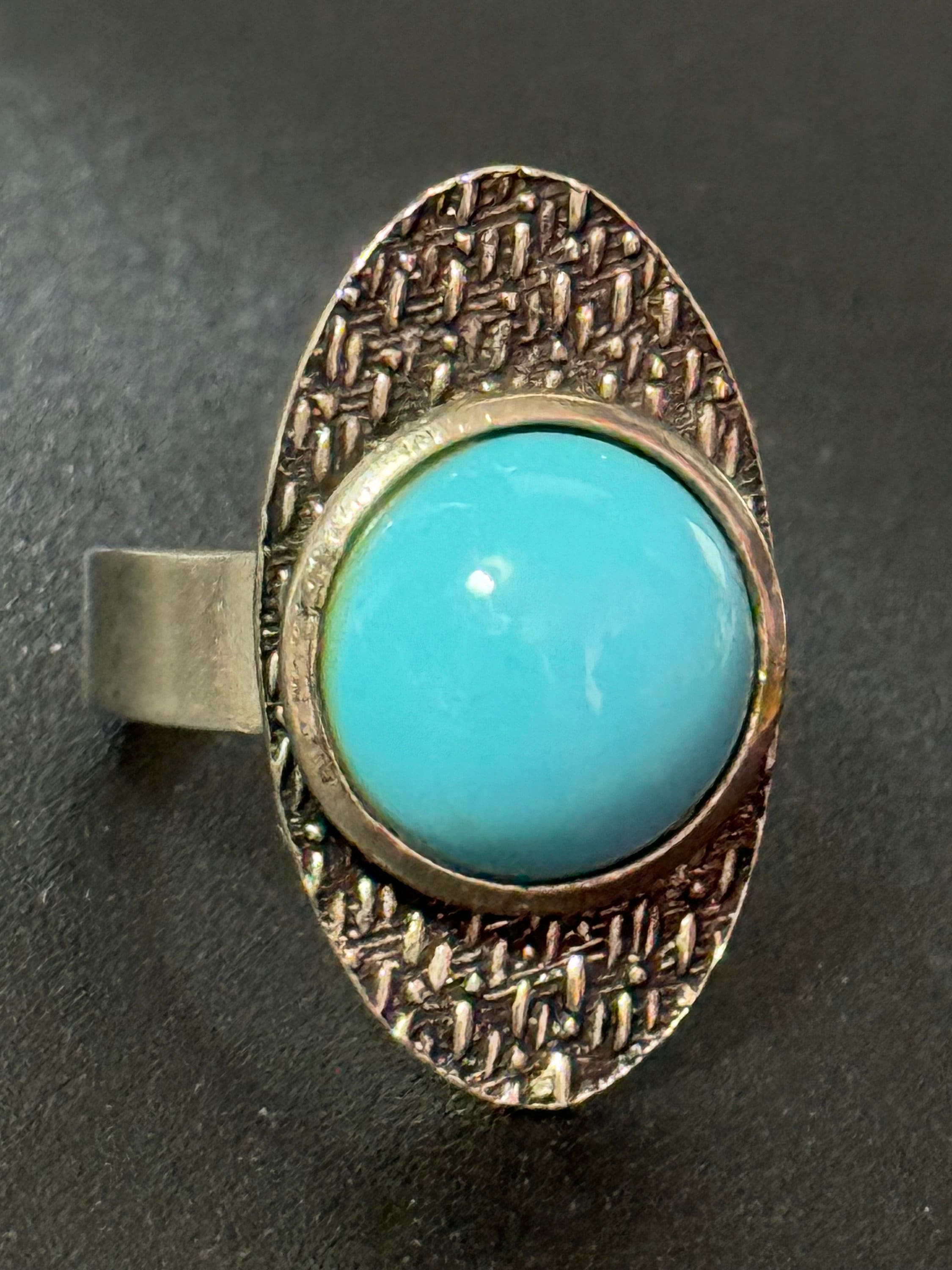 modernist stainless steel adjustable ring with central turquoise cabochon 1970s vintage