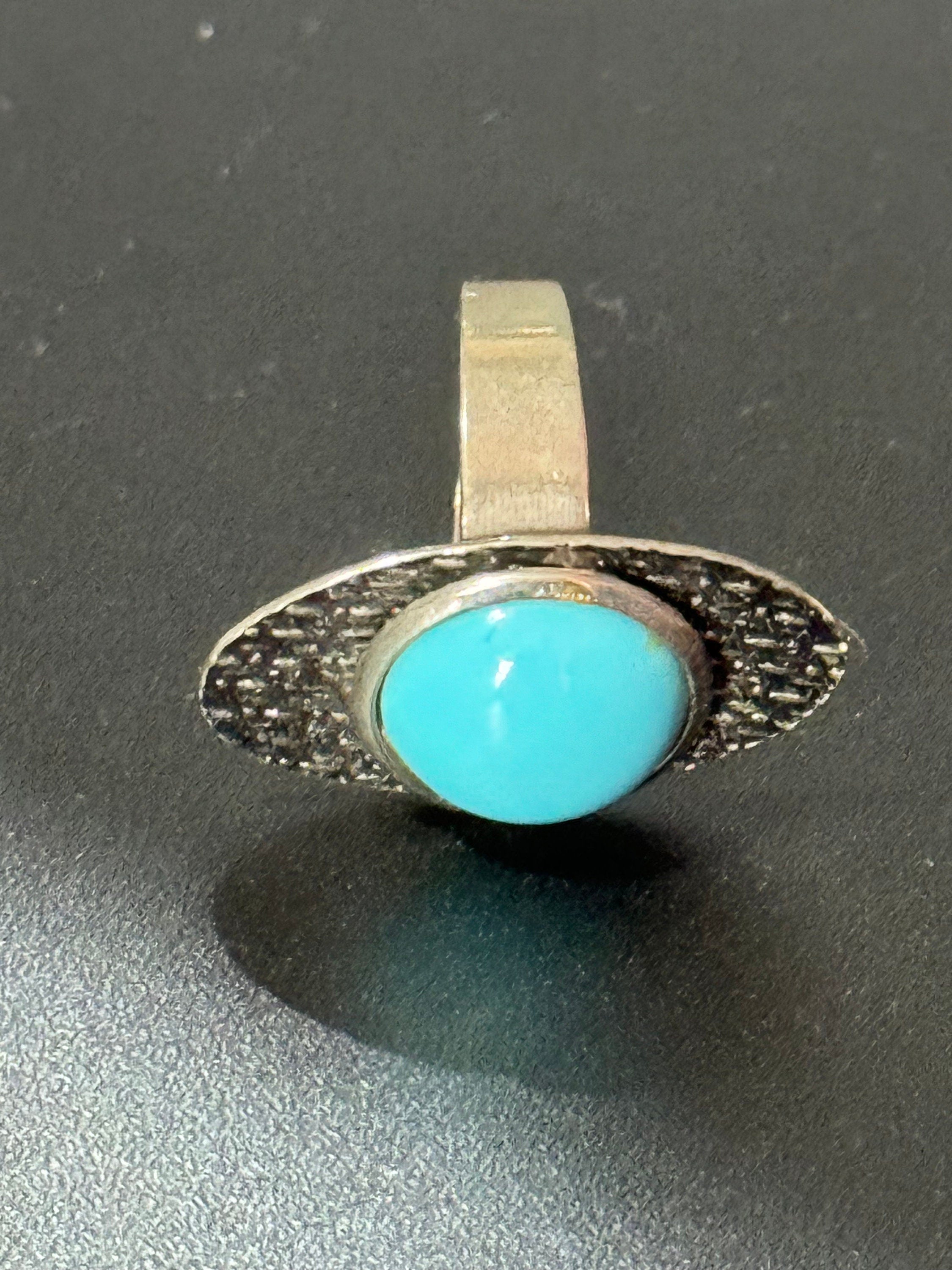 modernist stainless steel adjustable ring with central turquoise cabochon 1970s vintage