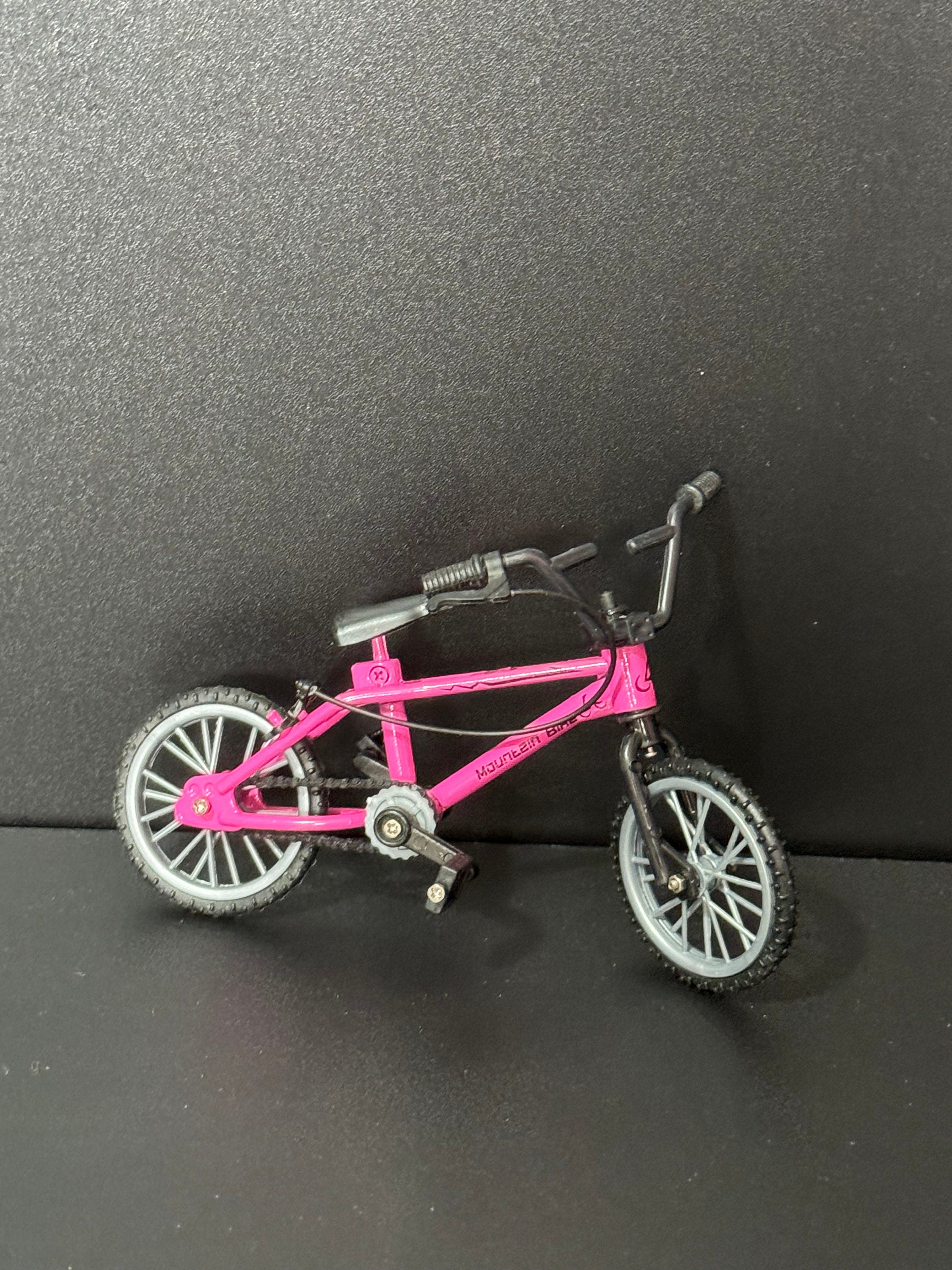 Miniature plastic girls ladies bright pink mountain bike BMX cake topper decoration