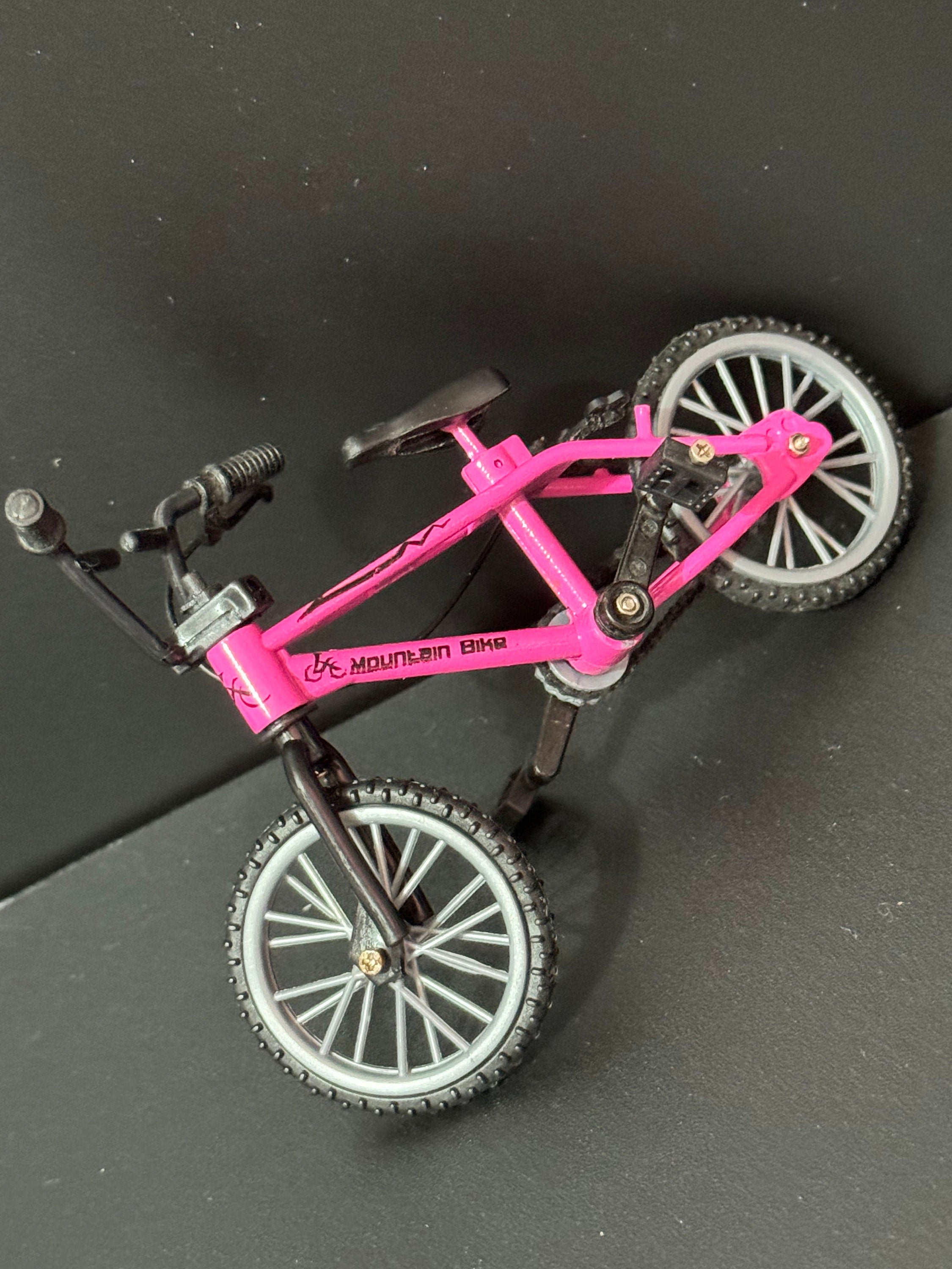 Miniature plastic girls ladies bright pink mountain bike BMX cake topper decoration