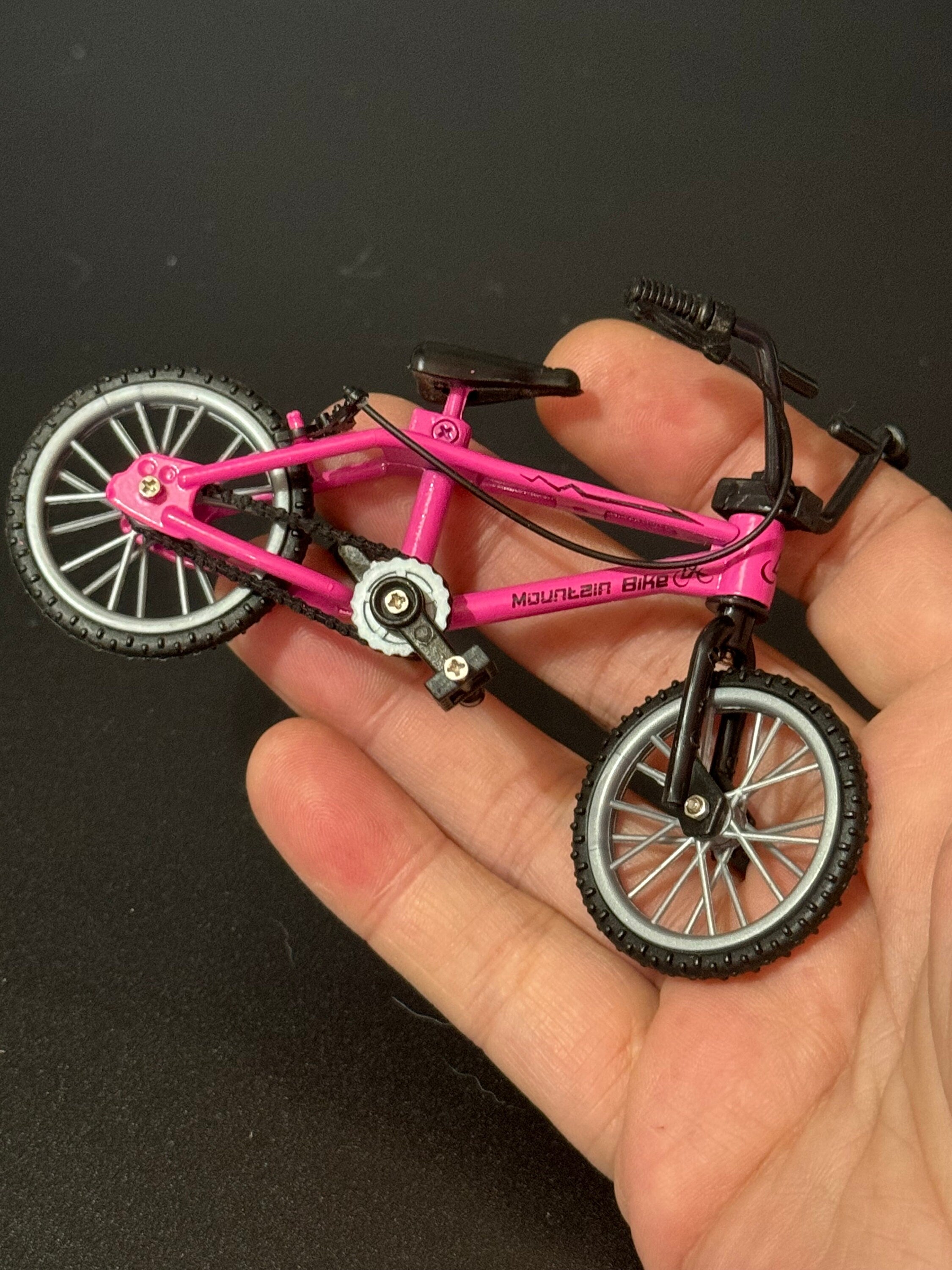 Miniature plastic girls ladies bright pink mountain bike BMX cake topper decoration