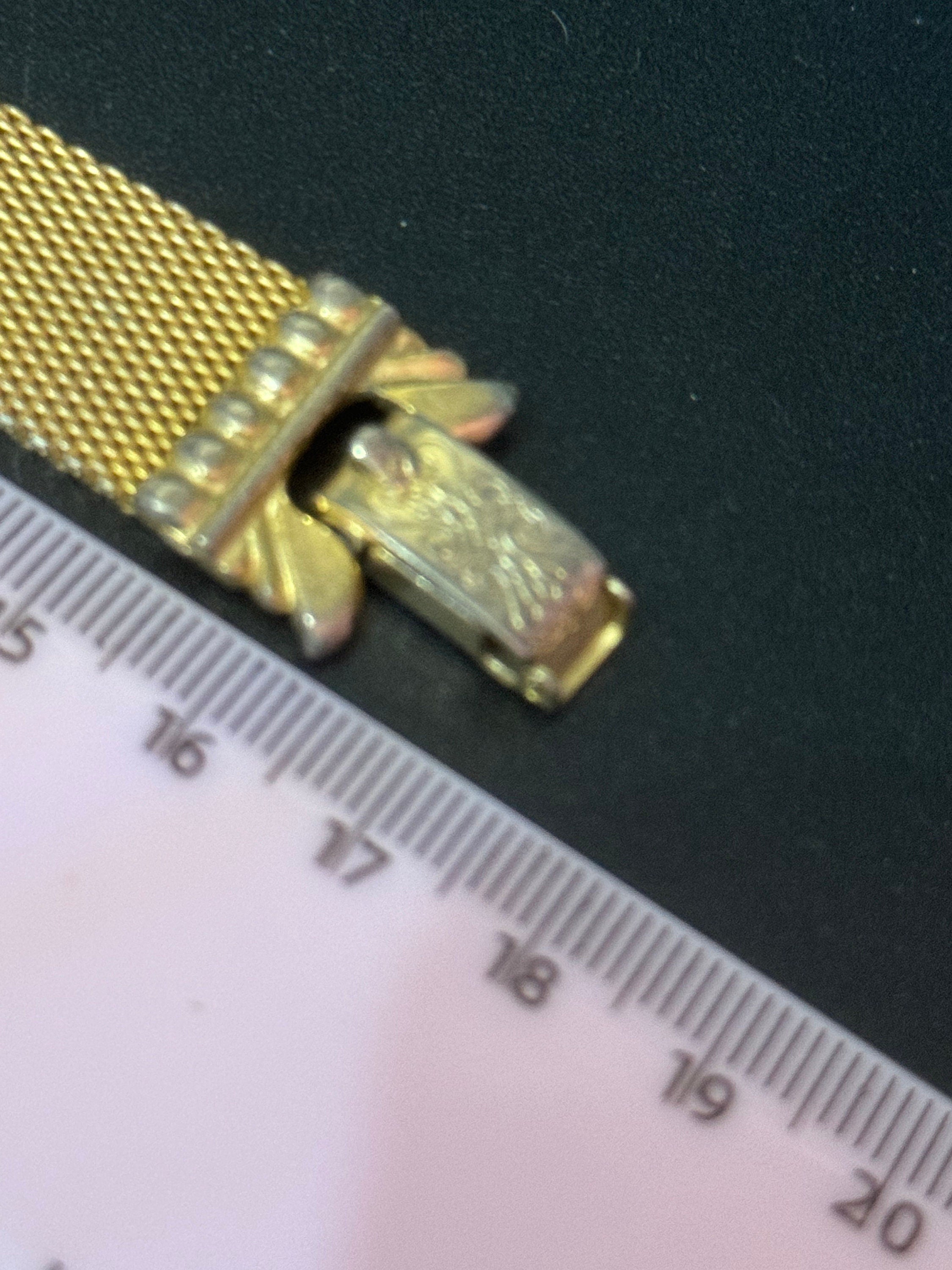 Vintage 1960s gold tone woven flat articulated Mesh bracelet with orange faux citrine cabochon 17.5cm long