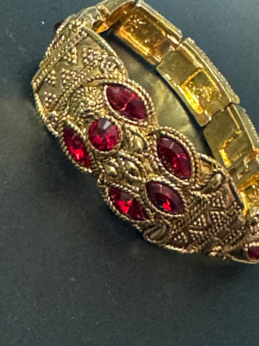 camrose and Kross signed JBK Jaqueline Kennedy vintage gold tone ruby red diamanté wide Byzantine medieval style panel bracelet