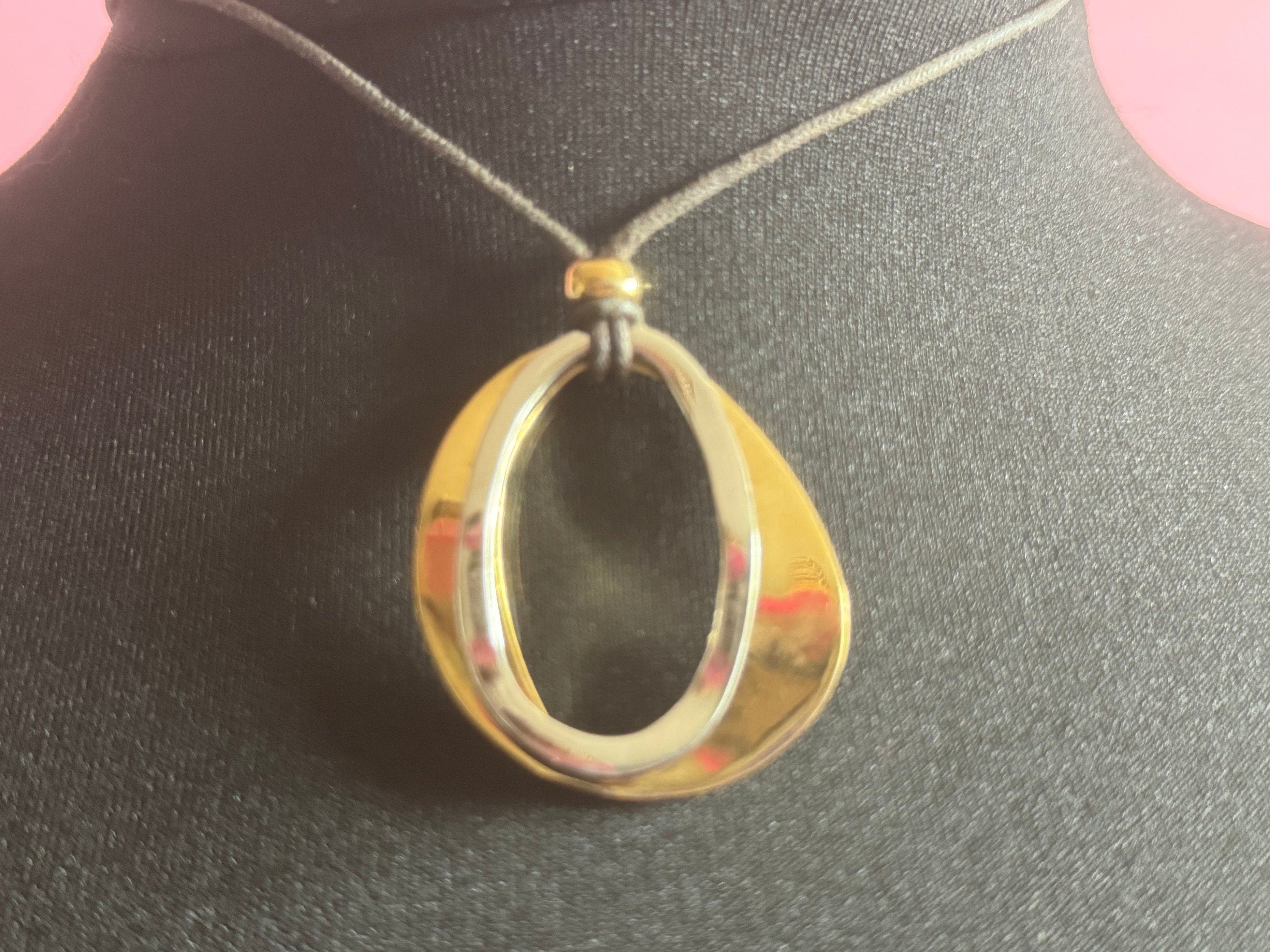 Vintage retro AGATHA PARIS signed gold and silver tone modernist abstract pendant necklace black leather