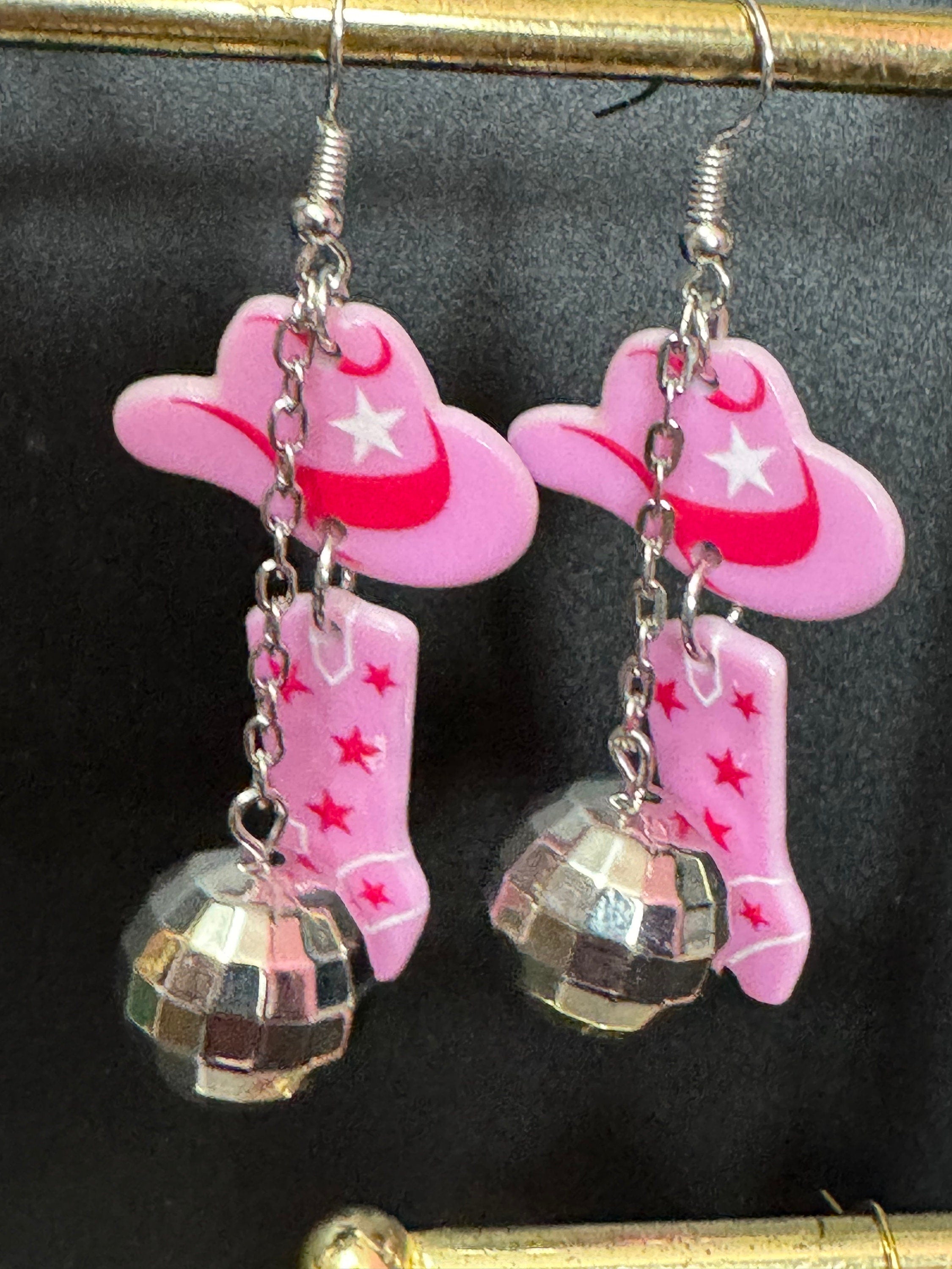 pink cowboy cowgirl hat boots and disco ball long dangly earrings silver tone dolly parton jewellery Yellowstone