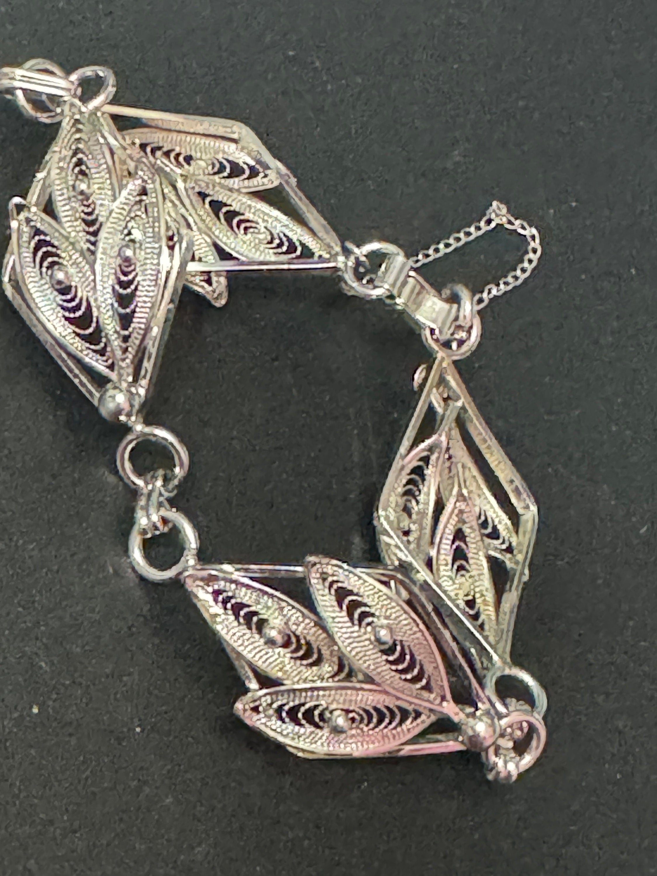 fine filigree work panel link bracelet , silver tone