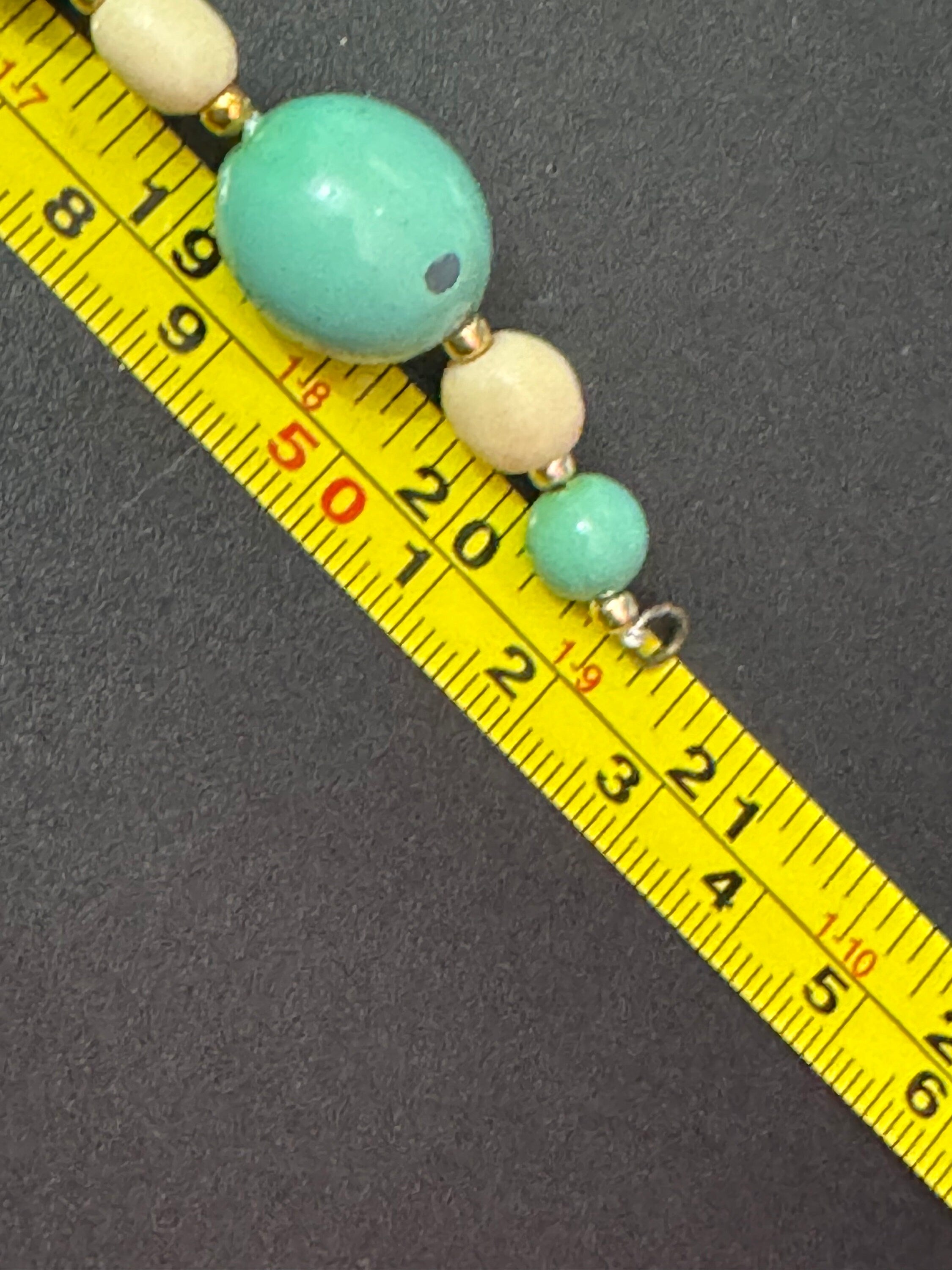 Vintage mid century panel link with leaves gold tone cuff bracelet with emerald green diamanté paste 20cm x 22mm