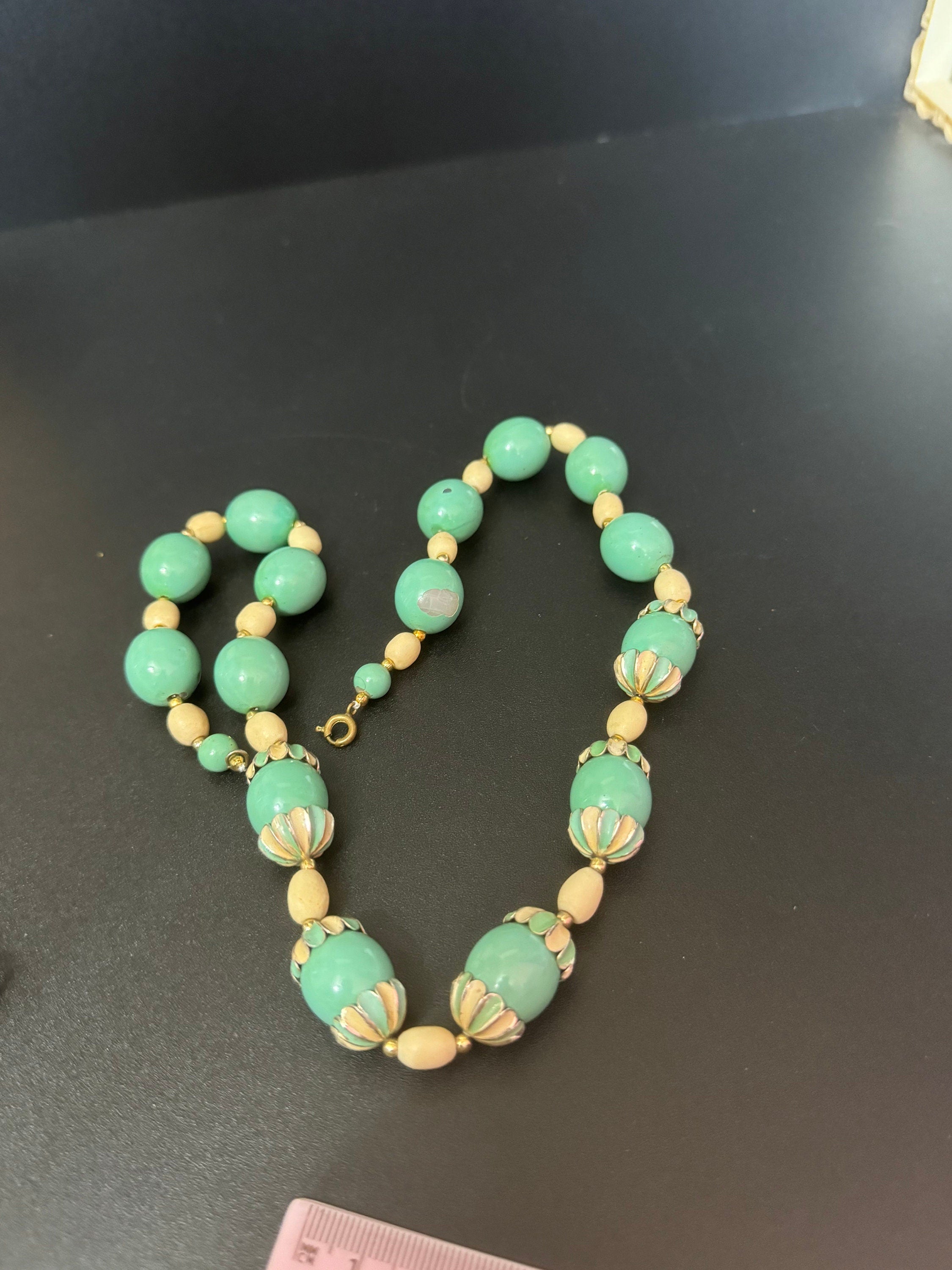 Vintage Mid Century Gold Tone Cuff Bracelet: Emerald Green Diamanté Leaves