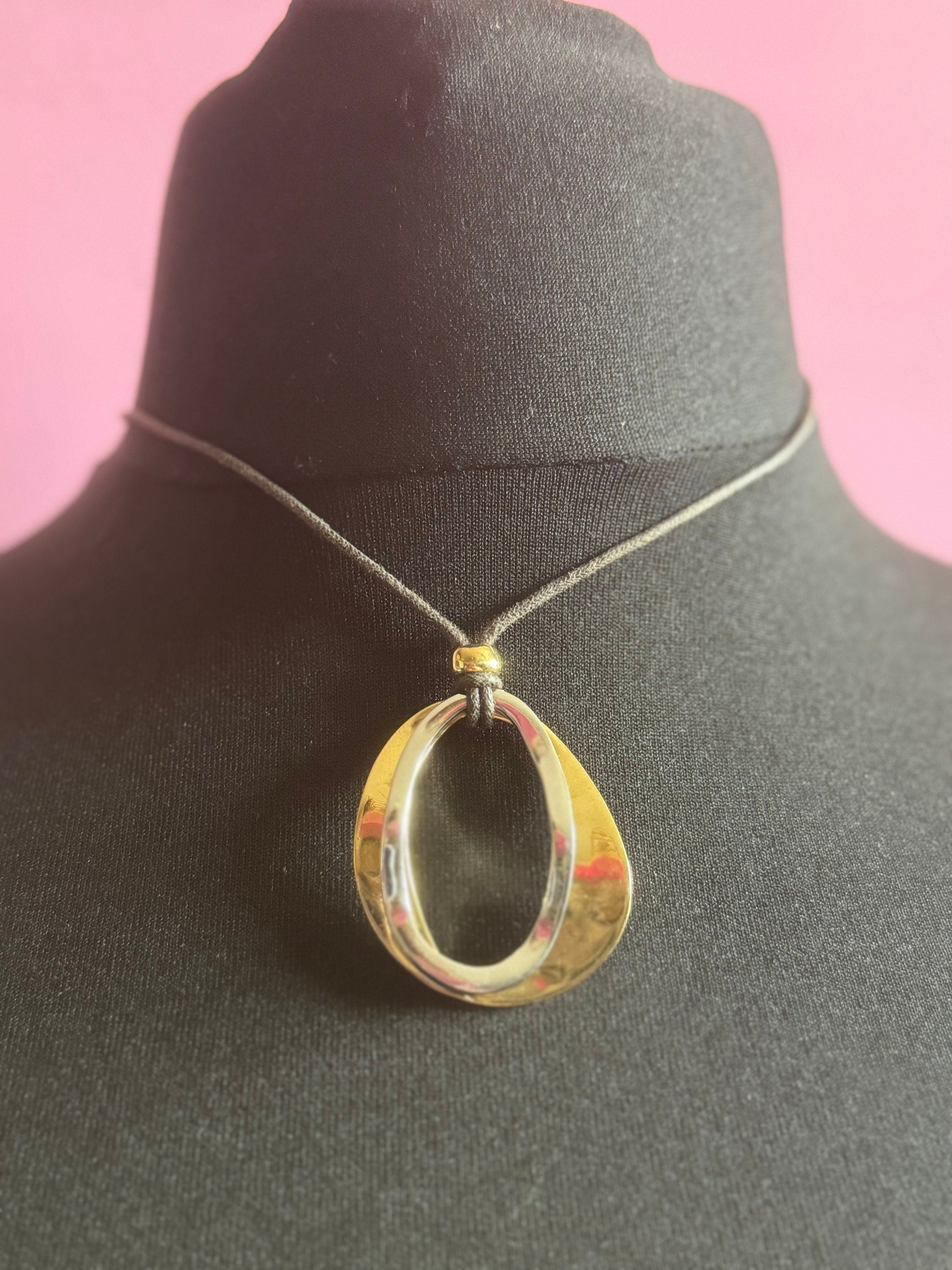 Vintage retro AGATHA PARIS signed gold and silver tone modernist abstract pendant necklace black leather