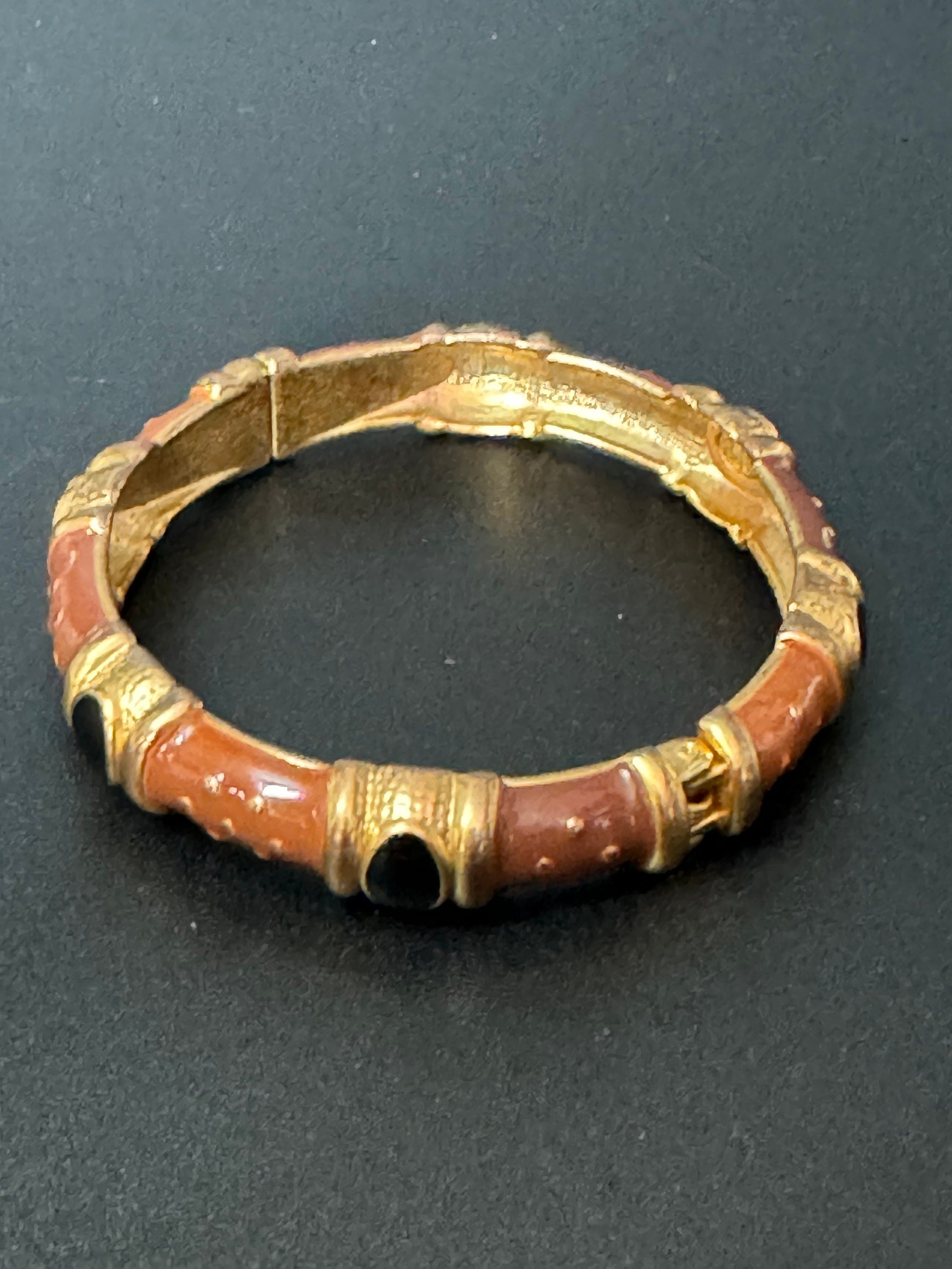 Signed Joan rivers gold plated brown black enamel clamper bangle cuff bracelet