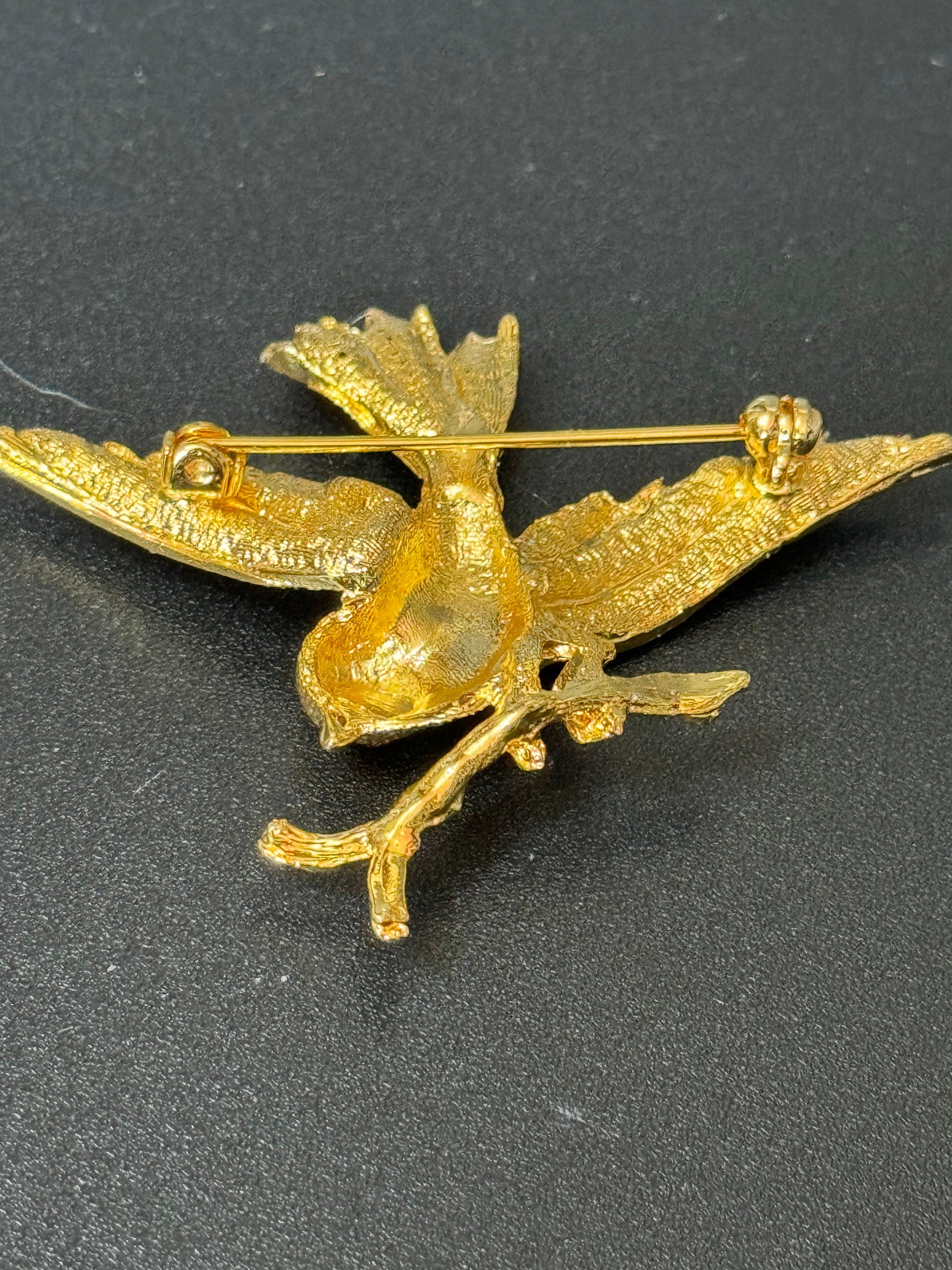 Vintage gold tone large Diamanté bird brooch Ruby eyes