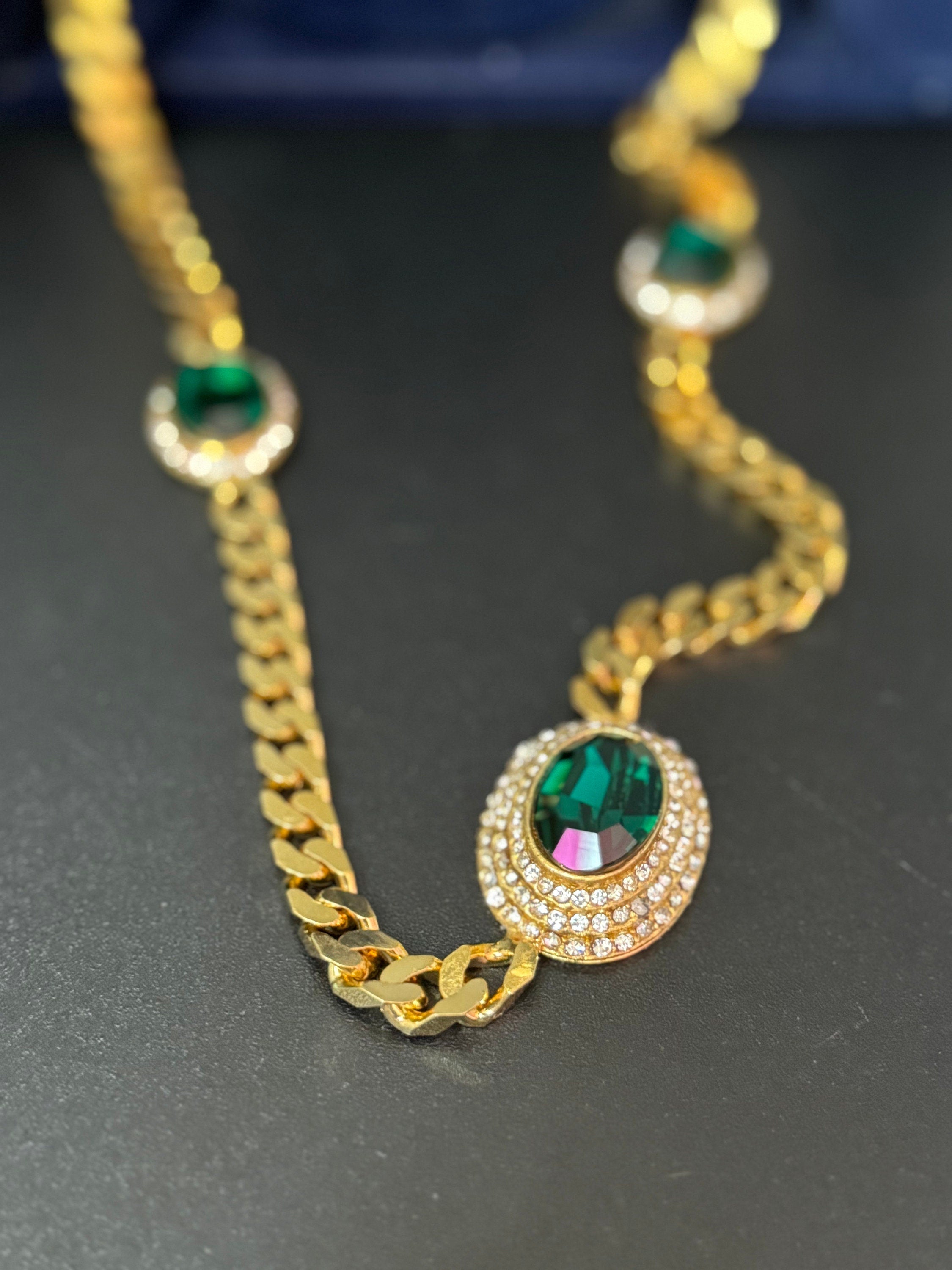 Vintage emerald green clear genuine Swarovski crystal gold tone oval rhinestone station necklace and clip on earrings