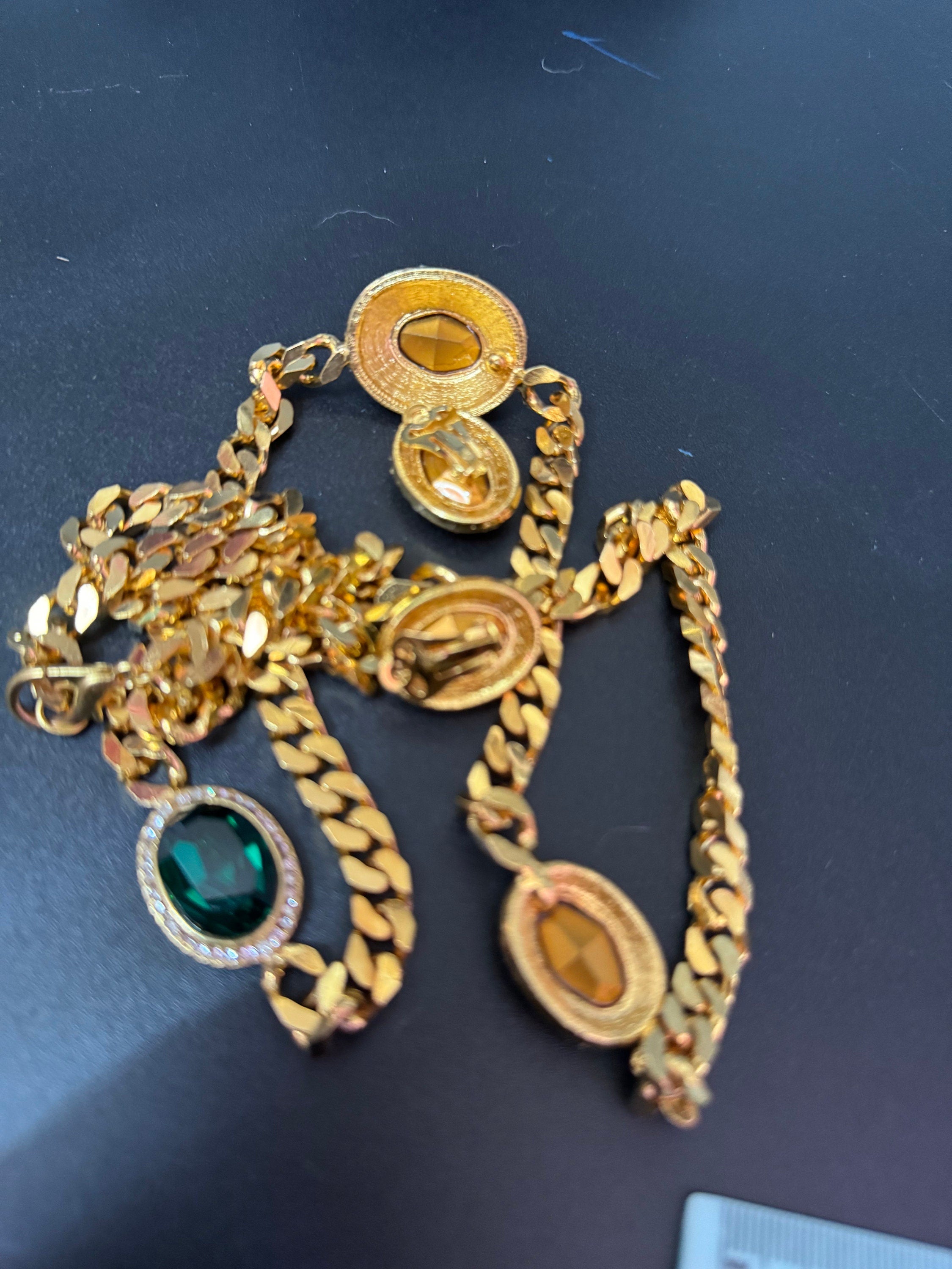 Vintage emerald green clear genuine Swarovski crystal gold tone oval rhinestone station necklace and clip on earrings