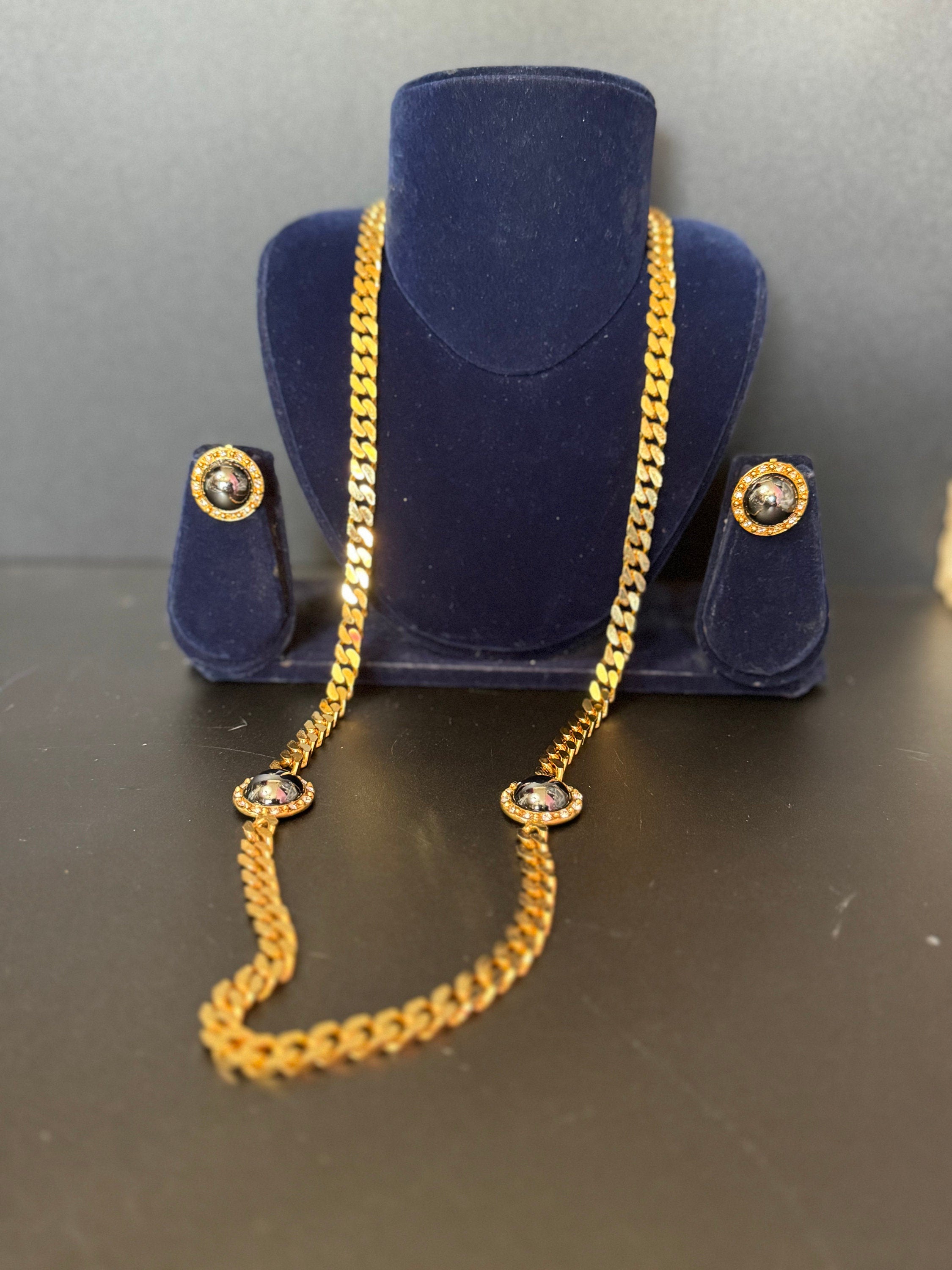 Vintage dark grey pearl domed cabochon clear genuine Swarovski crystal gold tone round rhinestone station necklace and clip on earrings