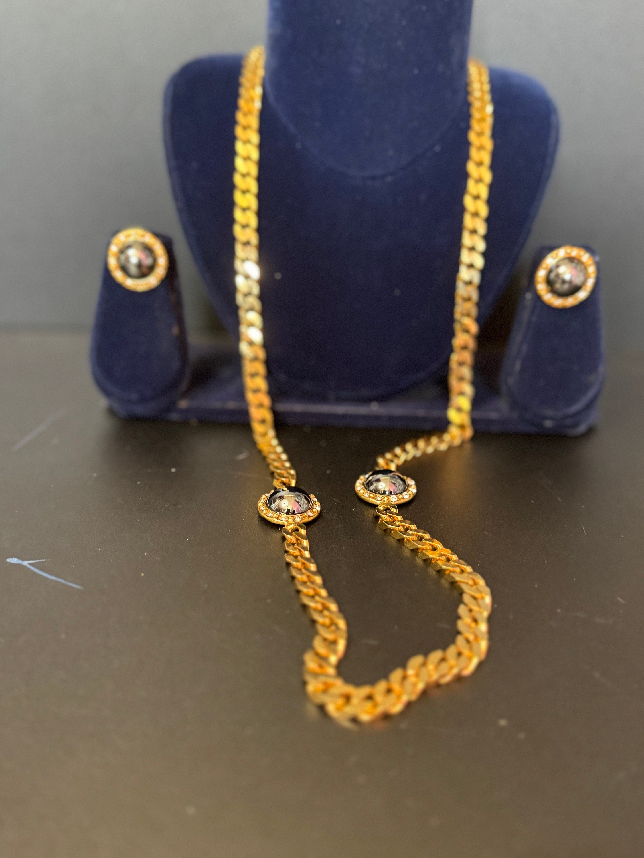 Vintage dark grey pearl domed cabochon clear genuine Swarovski crystal gold tone round rhinestone station necklace and clip on earrings