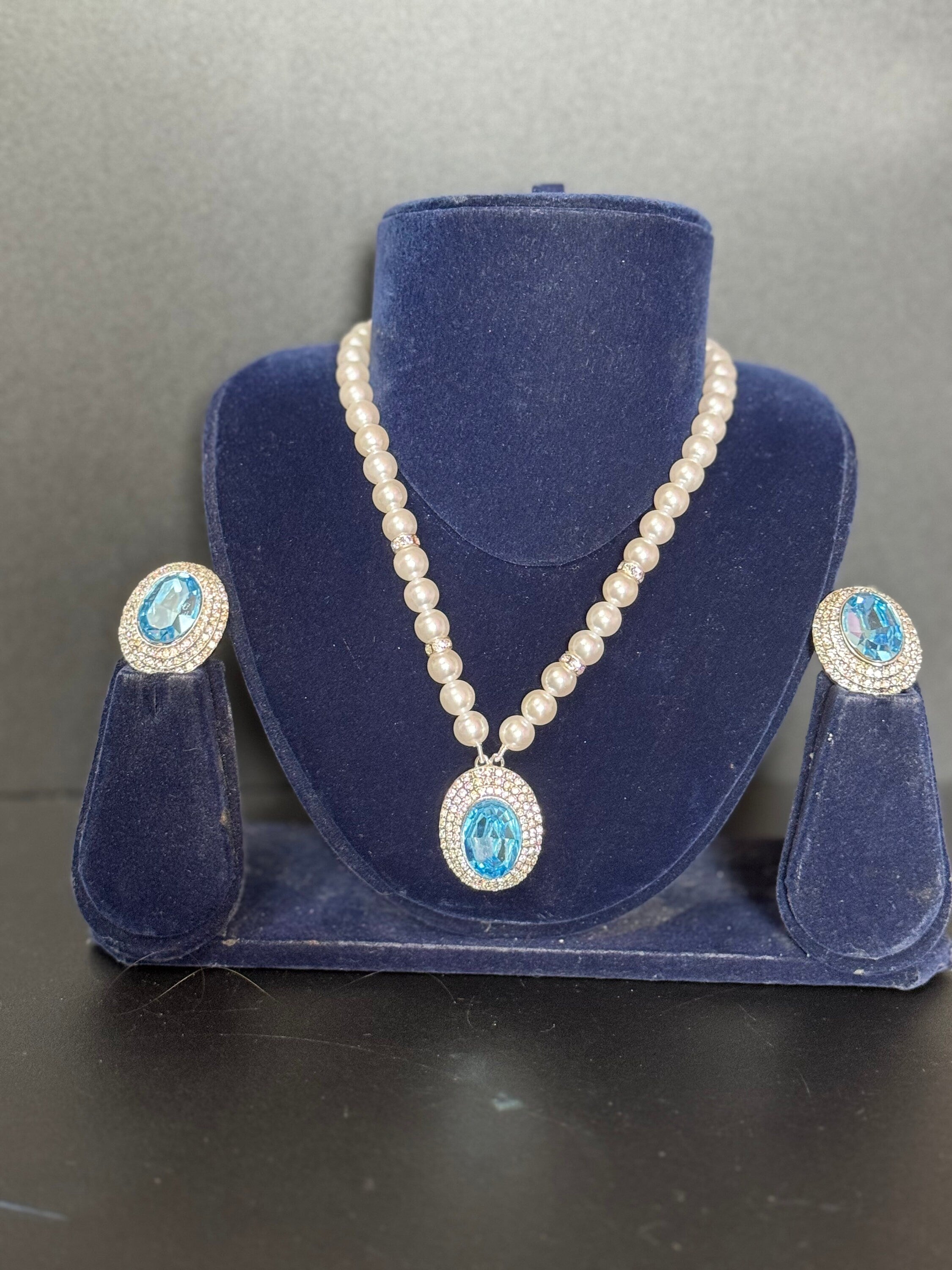 Vintage light sapphire blue oval clear Swarovski crystal silver tone faux acrylic pearl necklace and matching clip on earrings jewellery set