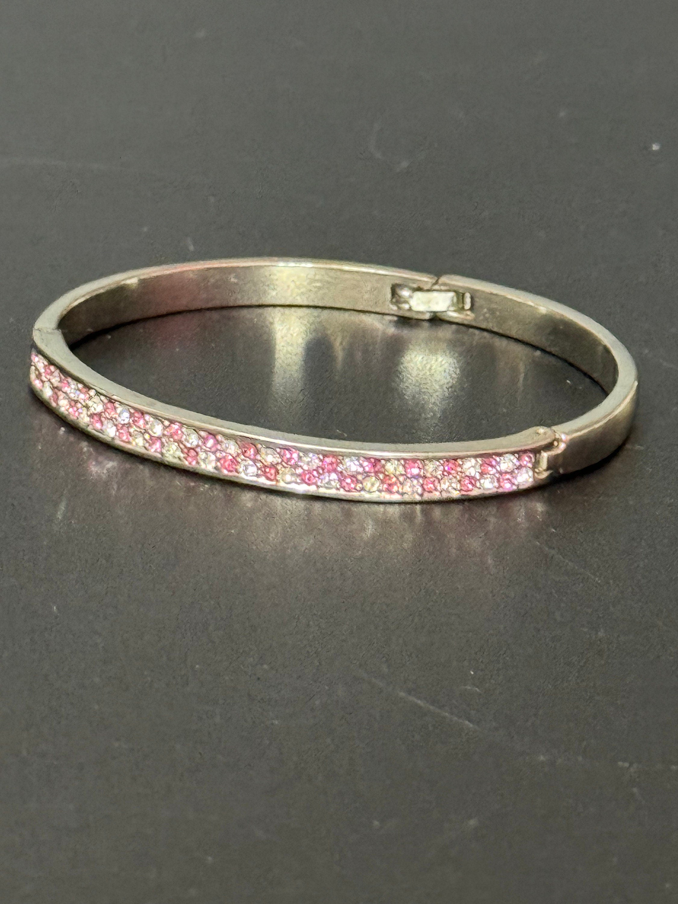 Vintage slim silver tone hinged bangle bracelet with pink glass rhinestones crystals