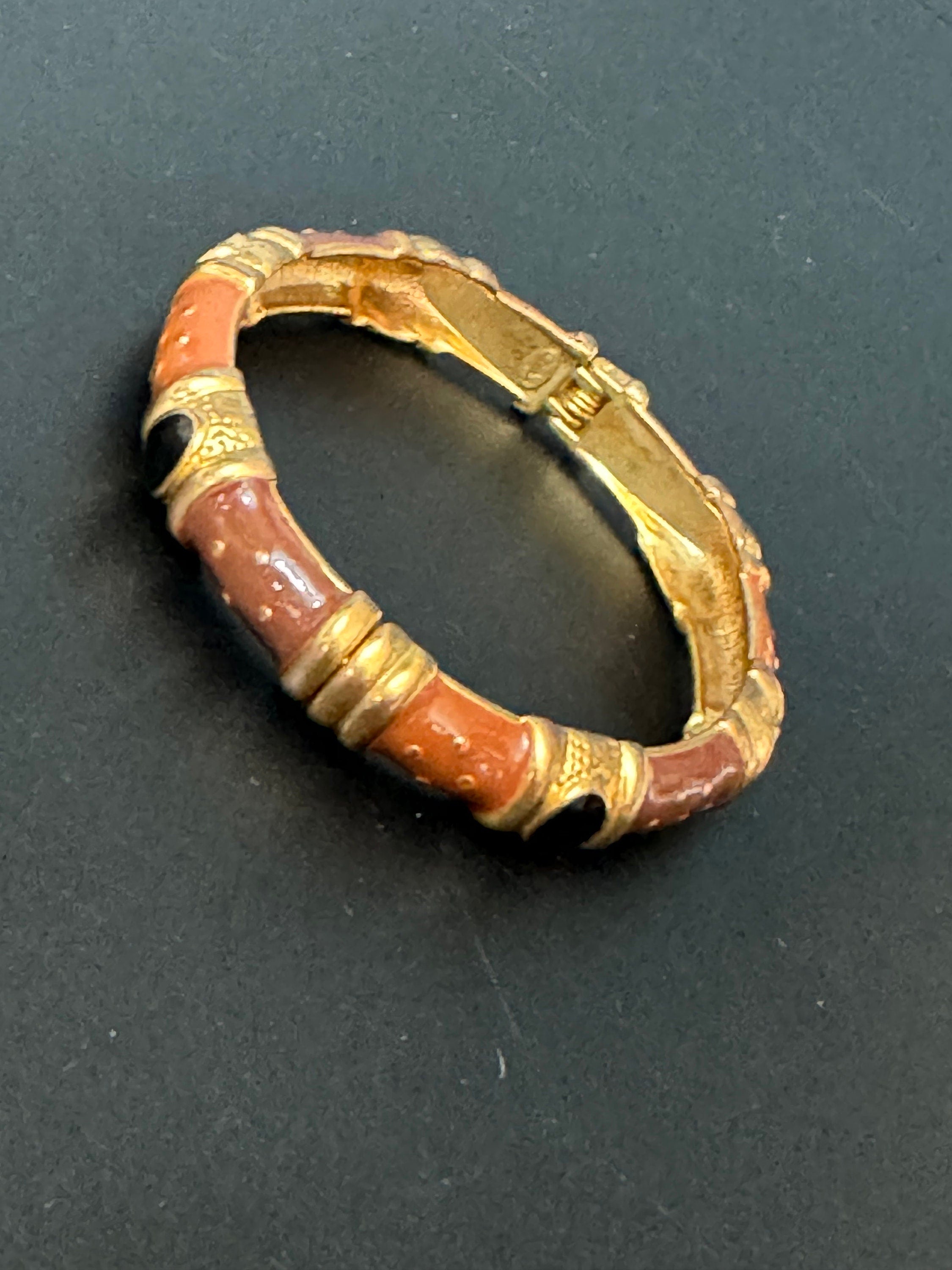 Signed Joan rivers gold plated brown black enamel clamper bangle cuff bracelet