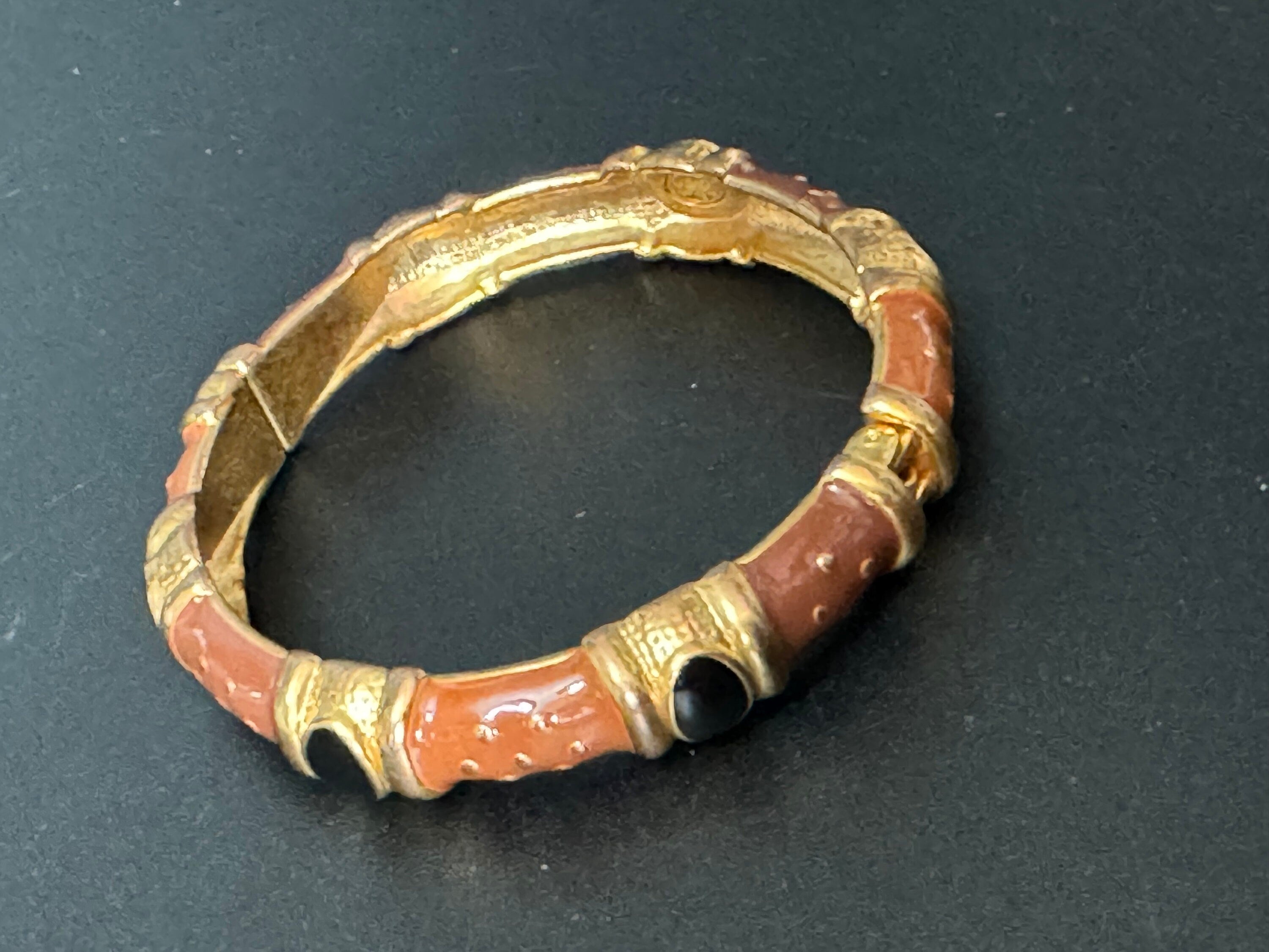 Signed Joan rivers gold plated brown black enamel clamper bangle cuff bracelet