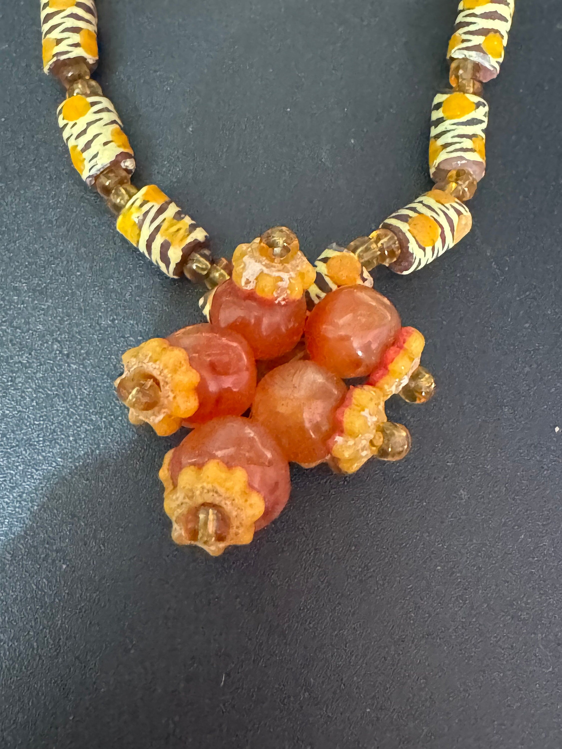 Signed Teng Yue african colours red ochre and mustard glass beaded necklace and stretch bracelet jewellery set