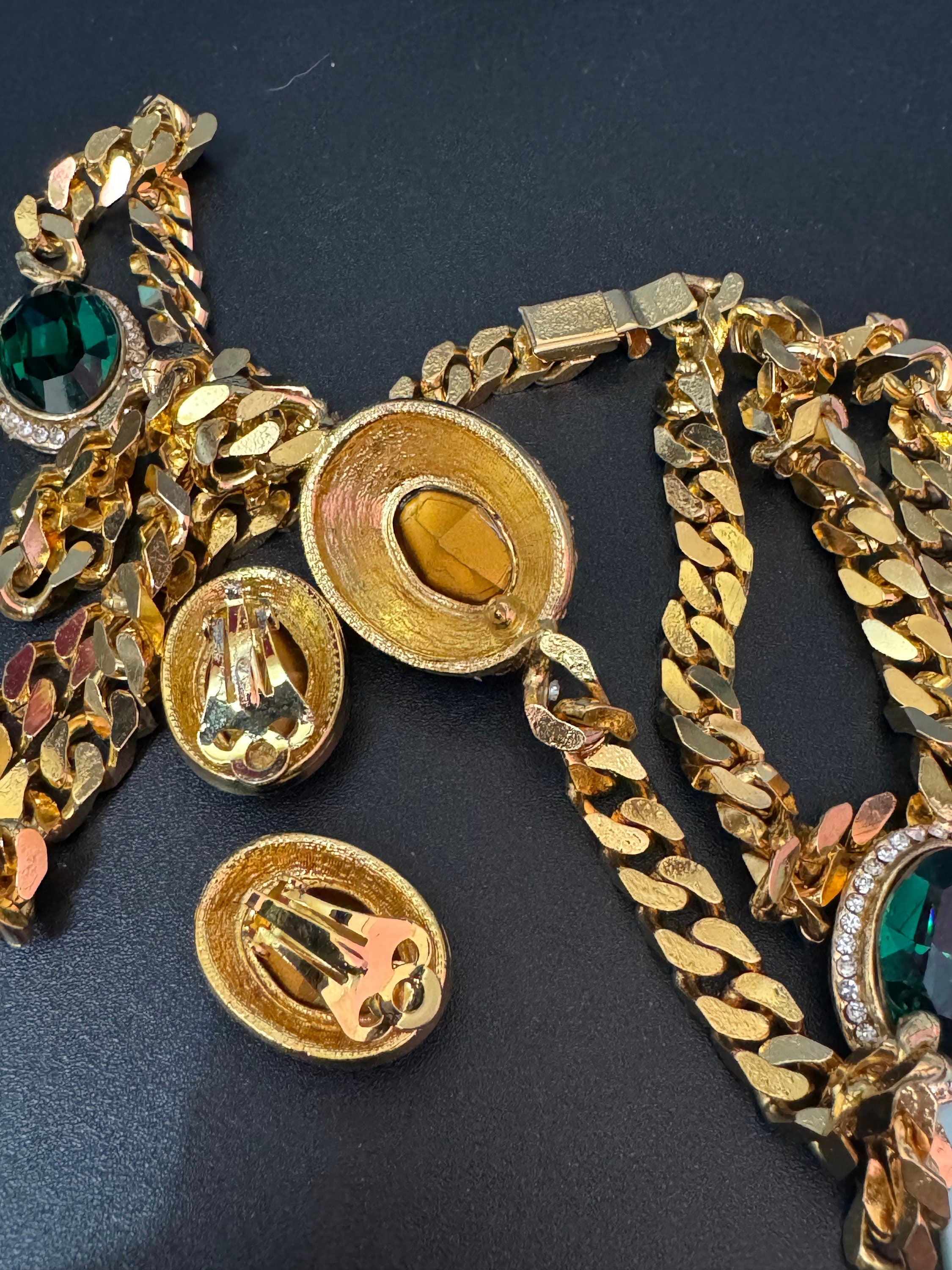 Vintage emerald green clear genuine Swarovski crystal gold tone oval rhinestone station necklace and clip on earrings