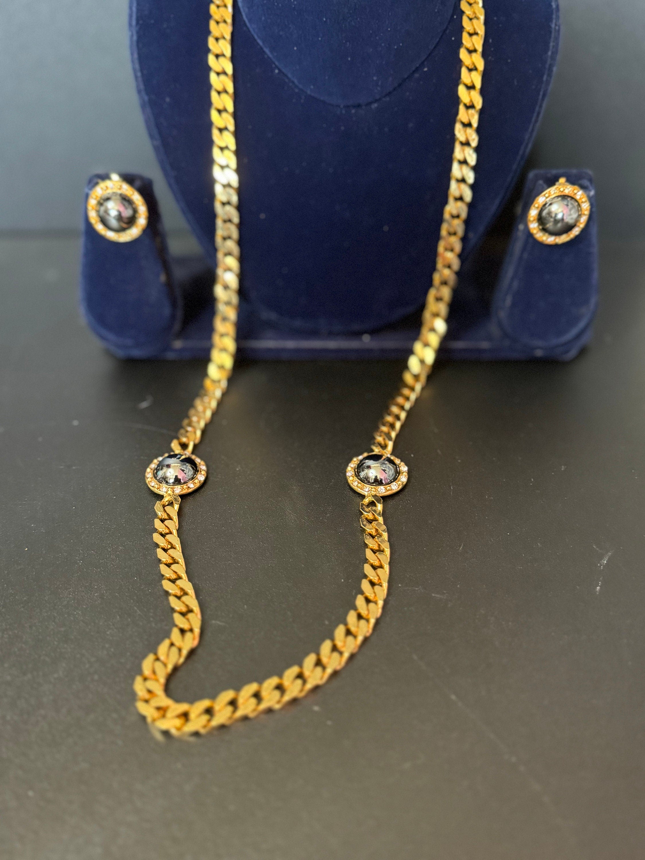 Vintage dark grey pearl domed cabochon clear genuine Swarovski crystal gold tone round rhinestone station necklace and clip on earrings
