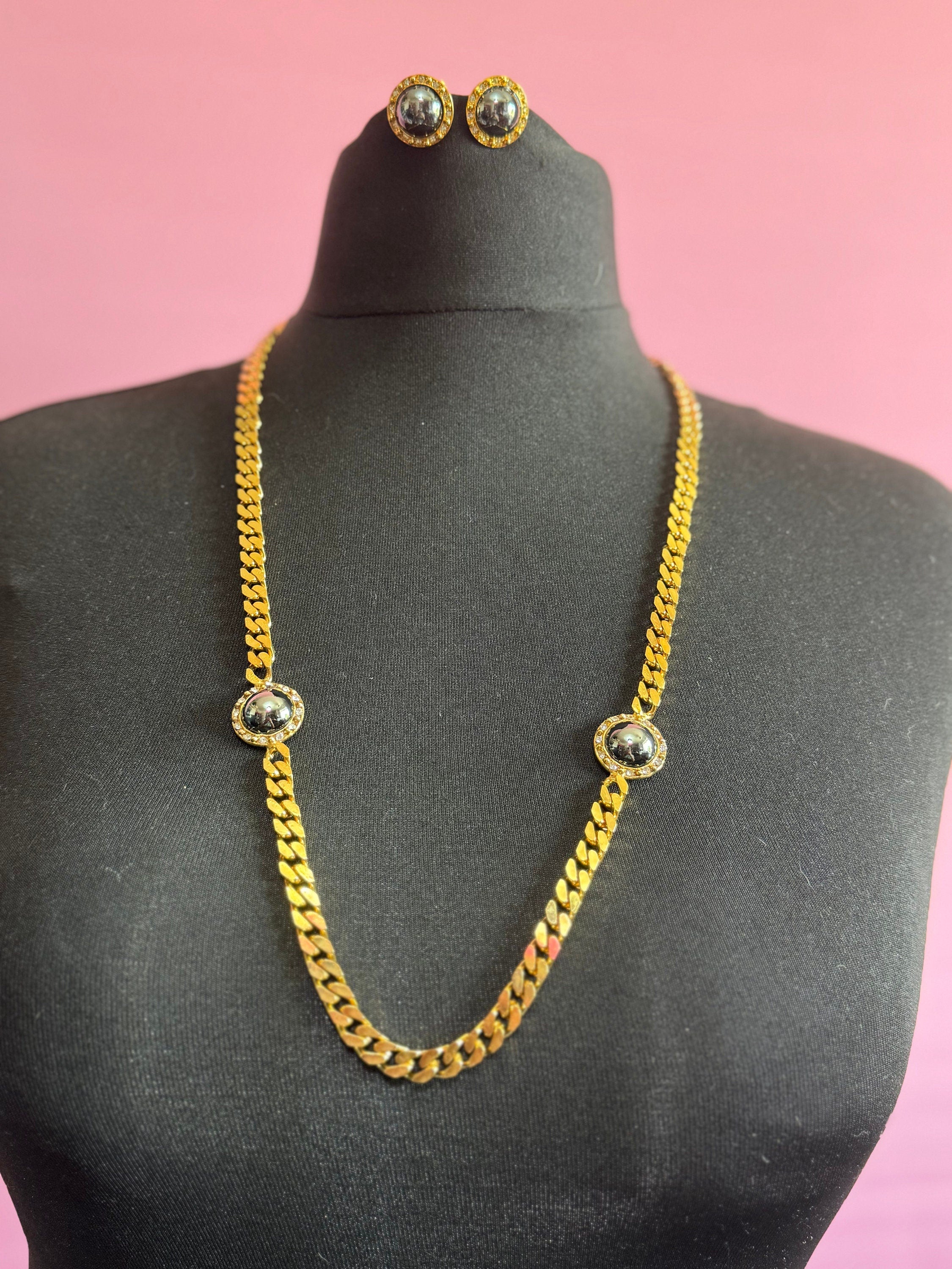 Vintage dark grey pearl domed cabochon clear genuine Swarovski crystal gold tone round rhinestone station necklace and clip on earrings