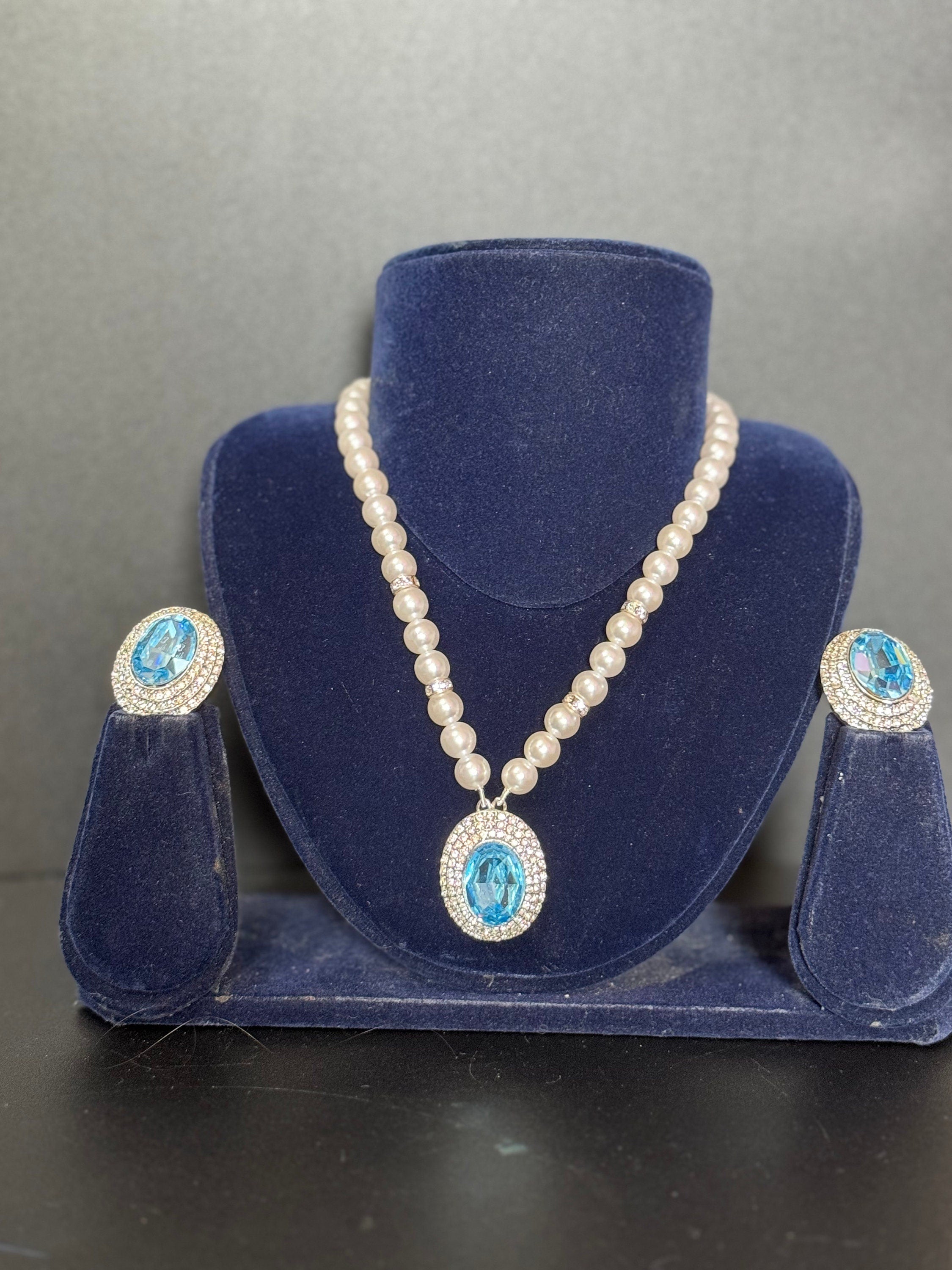 Vintage light sapphire blue oval clear Swarovski crystal silver tone faux acrylic pearl necklace and matching clip on earrings jewellery set