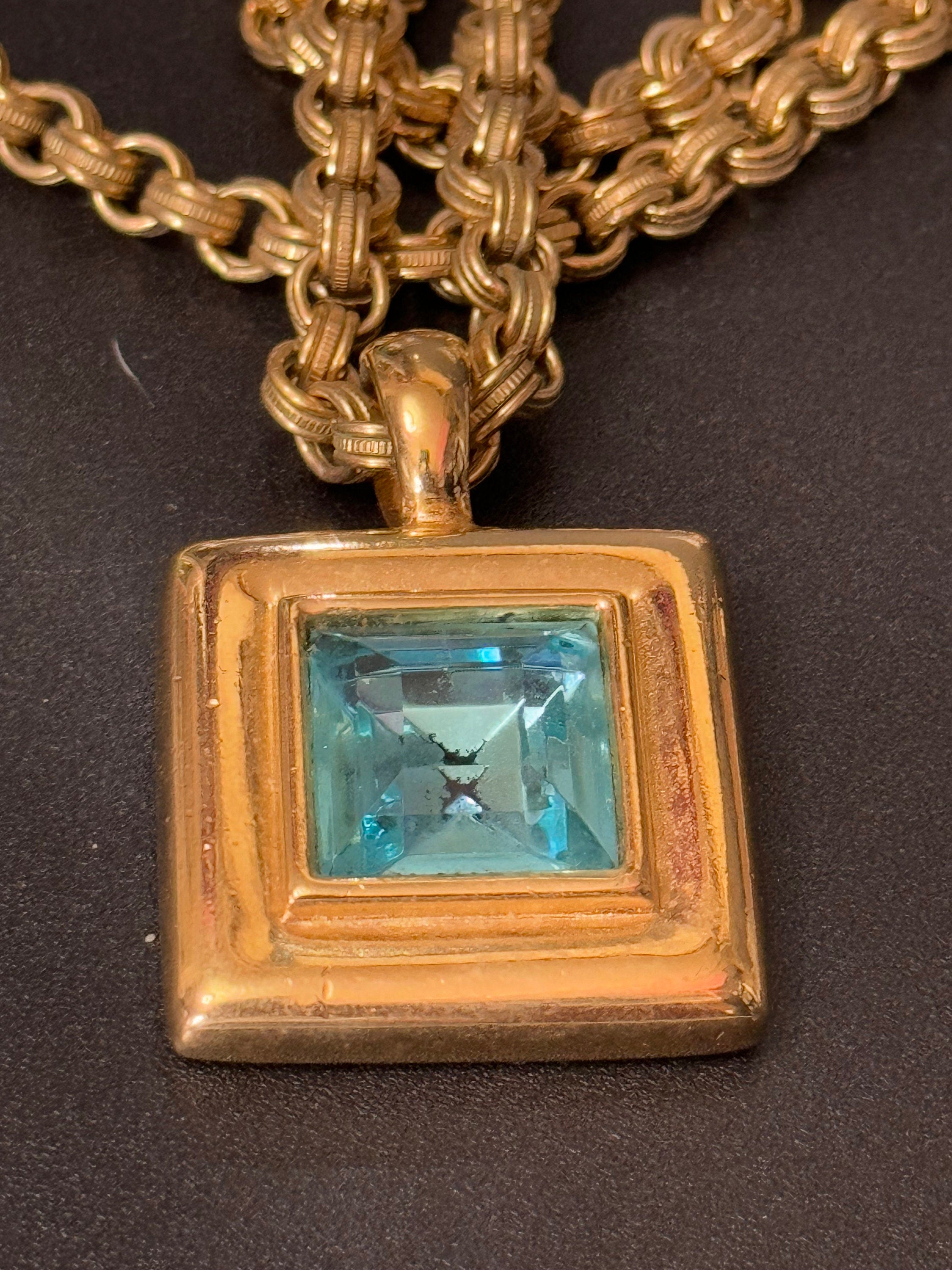Circa 1980s Givenchy, gold plated square turquoise blue crystal pendant necklace on signed 80cm toggle chain, New York designer