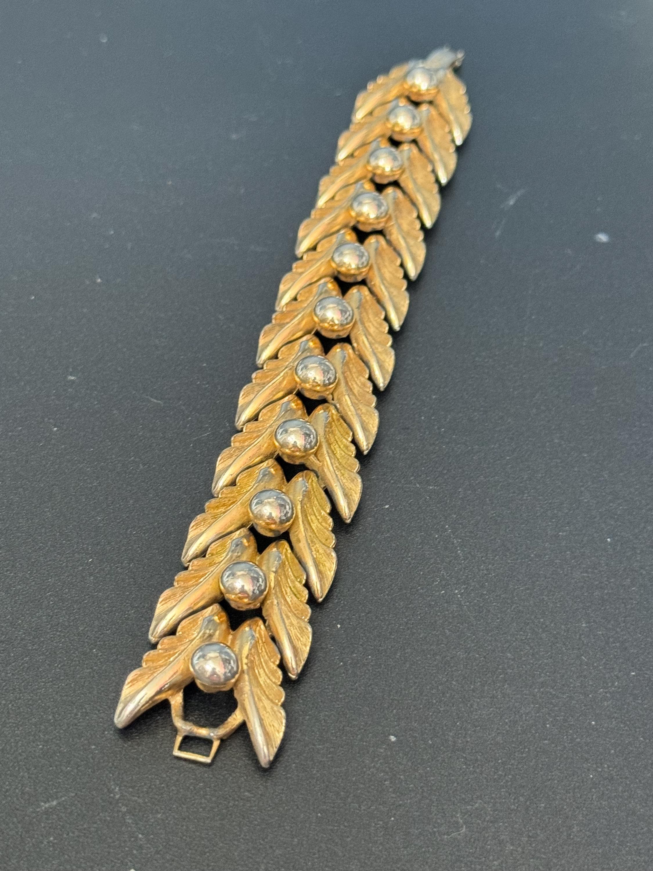 Vintage gold tone mid century textured ball and leaf design panel link wide bracelet