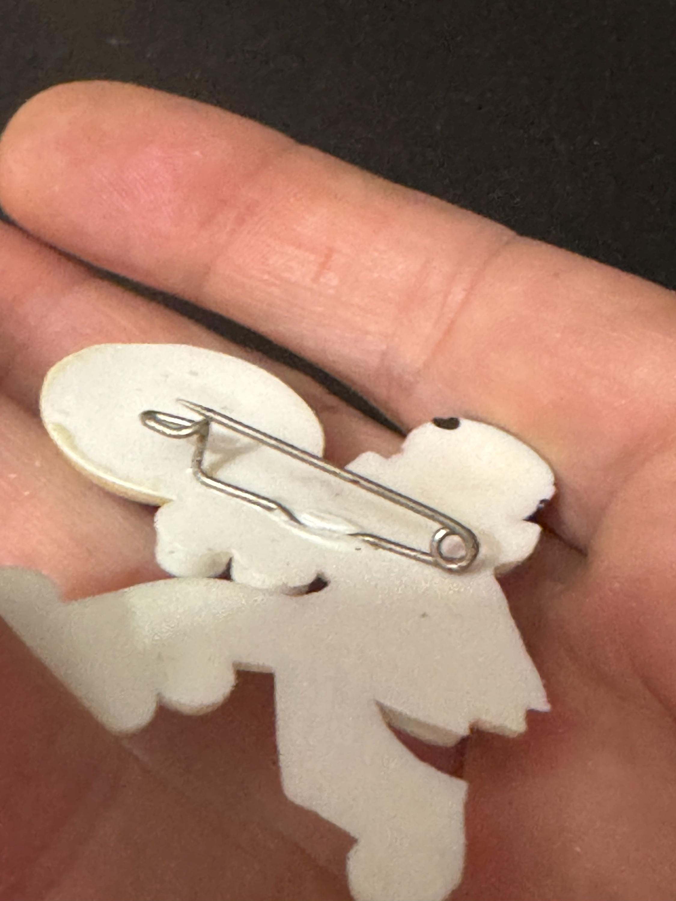 white plastic Pierrot brooch, vintage 1960s French clown