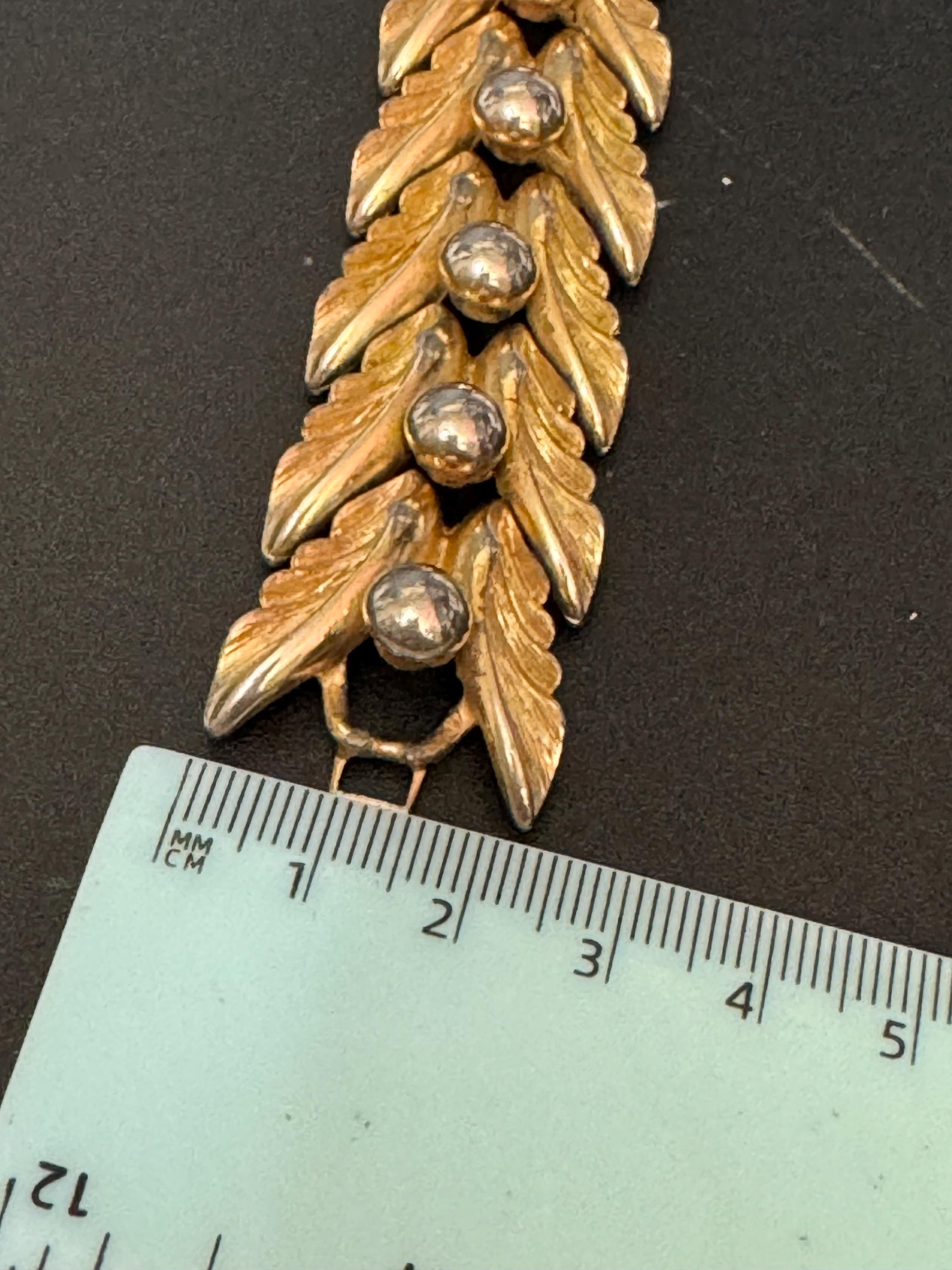 Vintage gold tone mid century textured ball and leaf design panel link wide bracelet