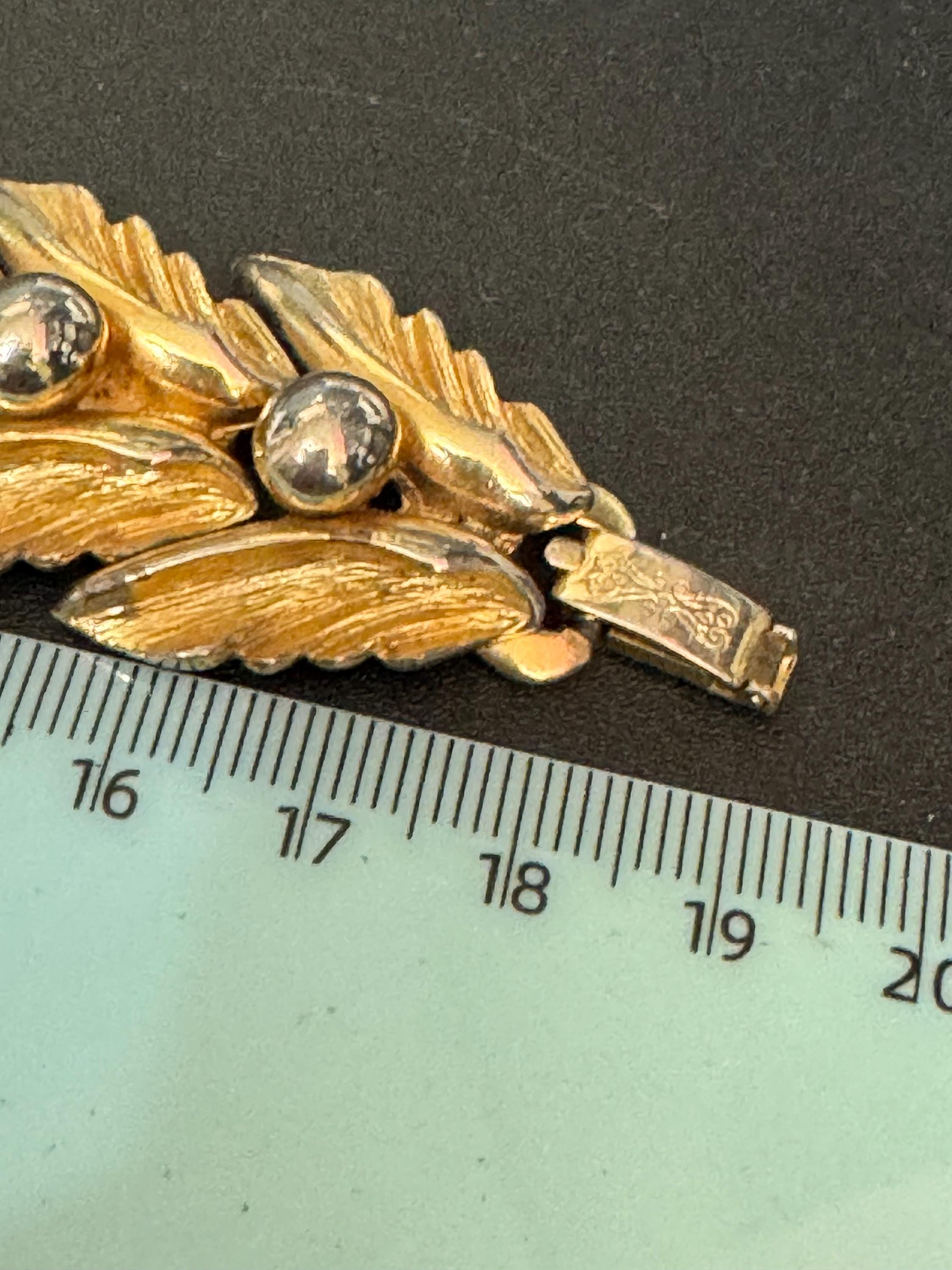 Vintage gold tone mid century textured ball and leaf design panel link wide bracelet