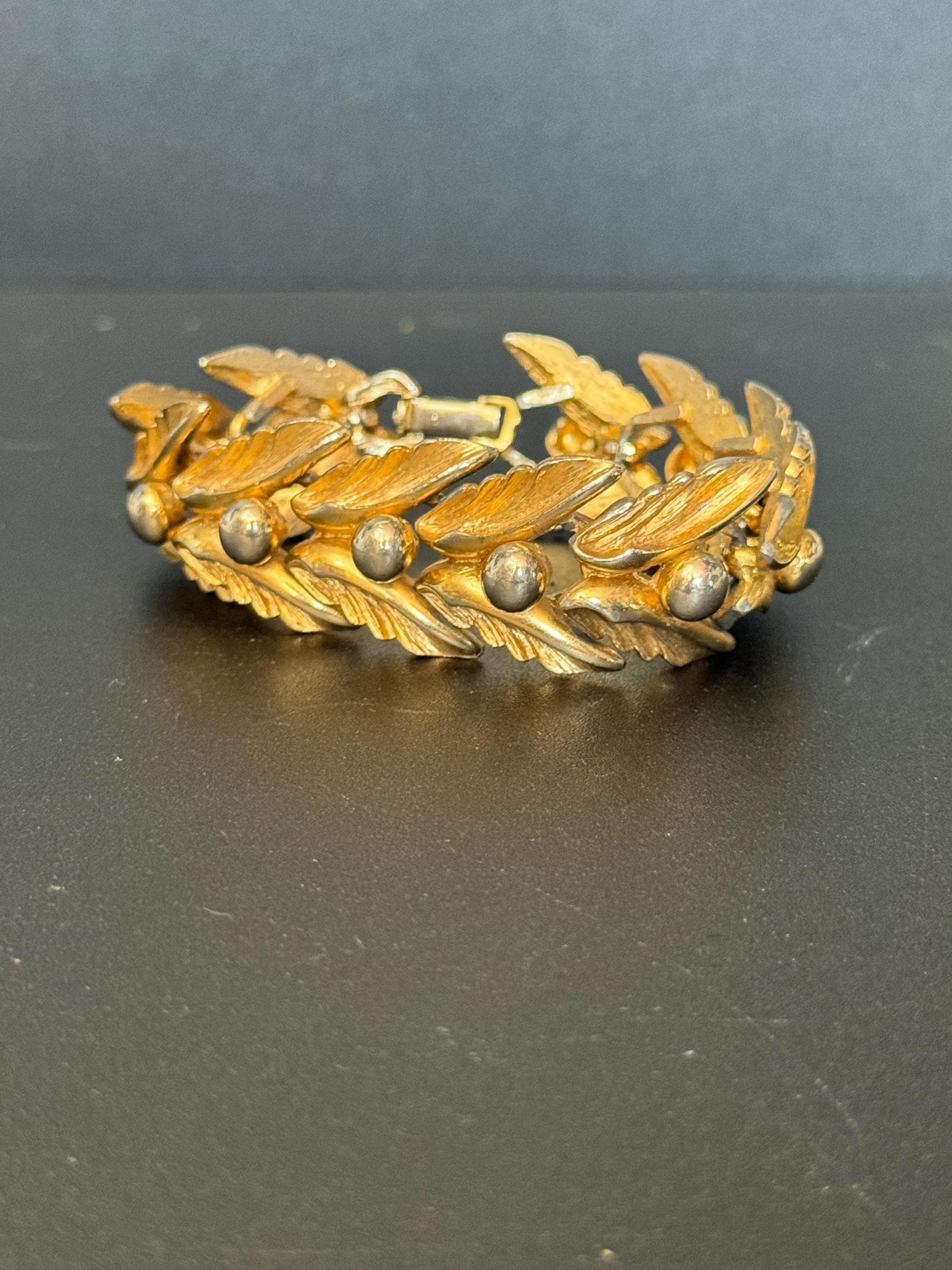 Vintage gold tone mid century textured ball and leaf design panel link wide bracelet