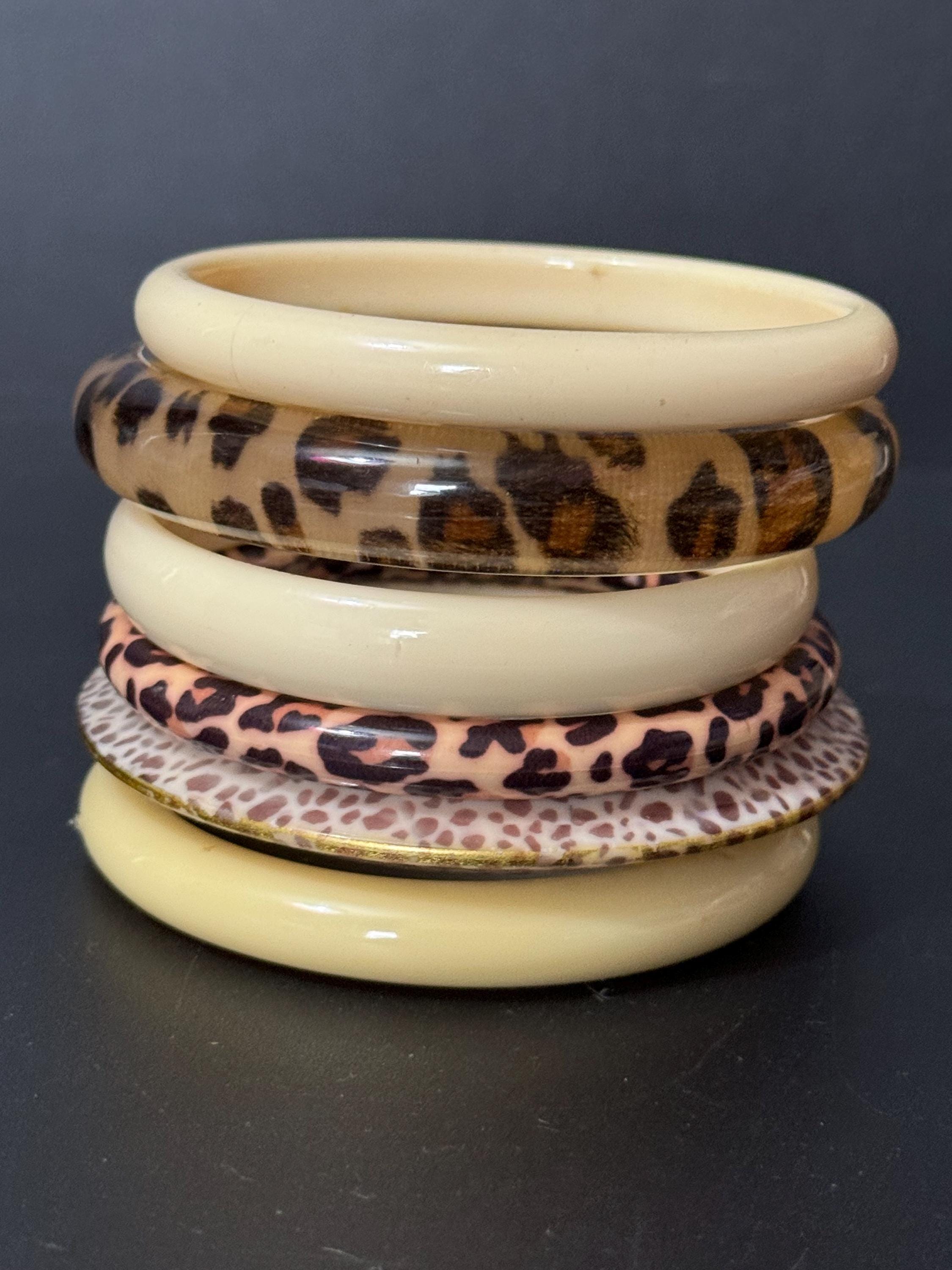 Cream brown yellow animal print beige stack of vintage retro plastic bangles