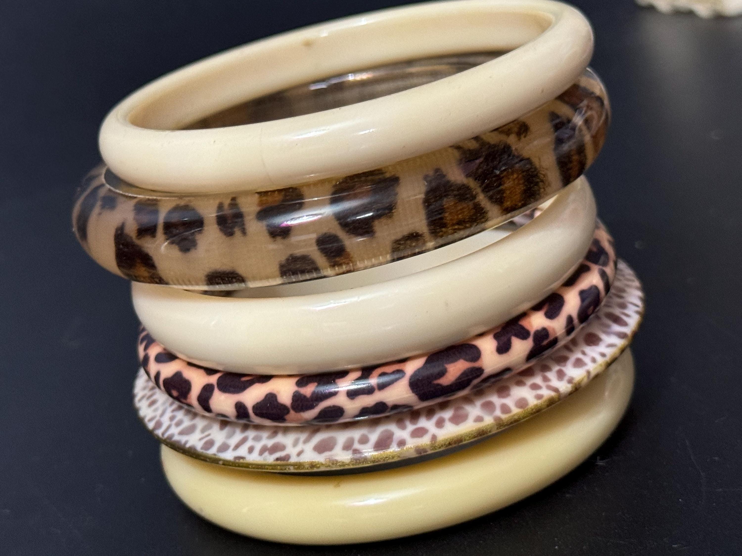 Cream brown yellow animal print beige stack of vintage retro plastic bangles
