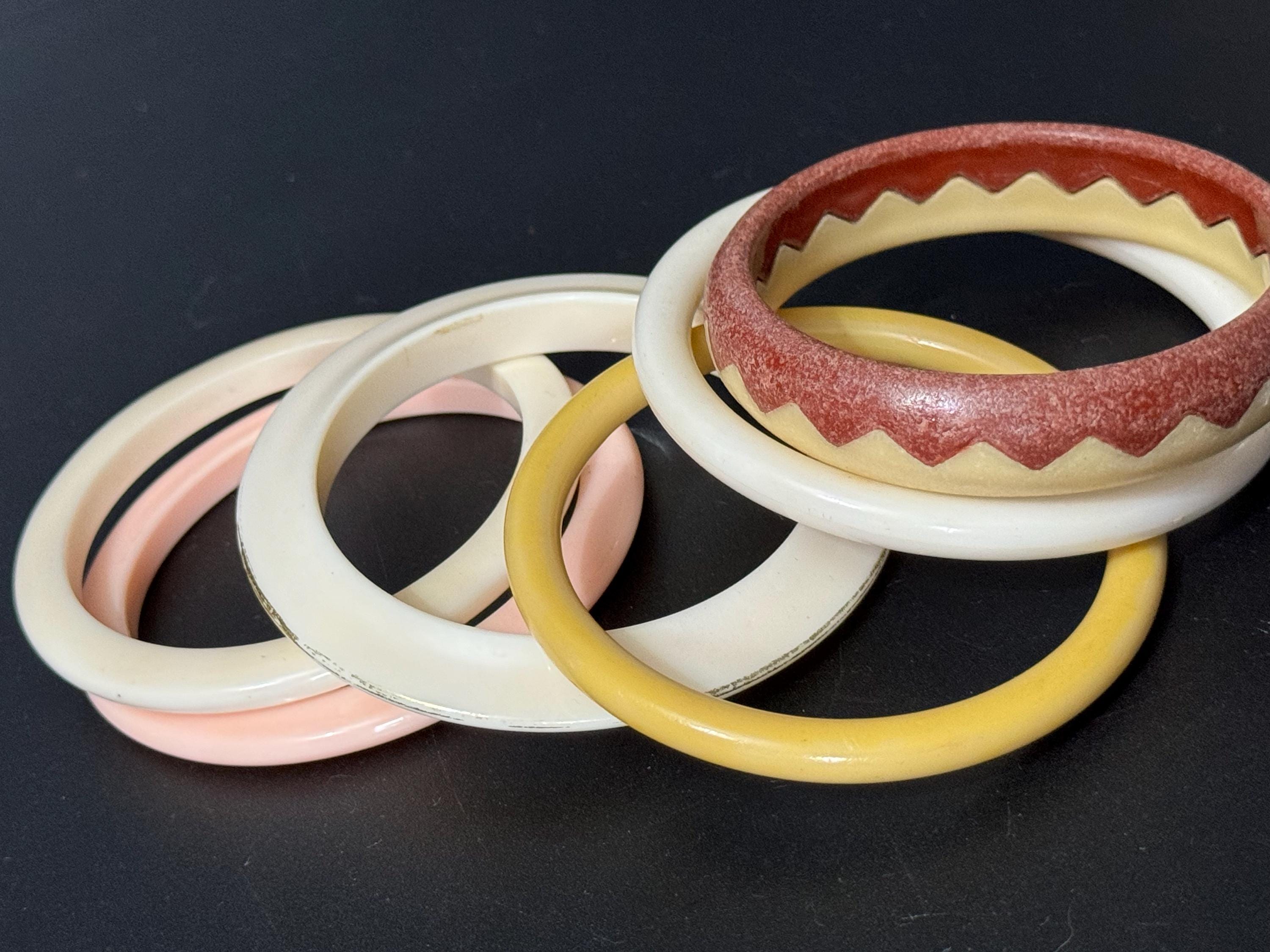 Cream pink brown beige stack of vintage retro plastic bangles
