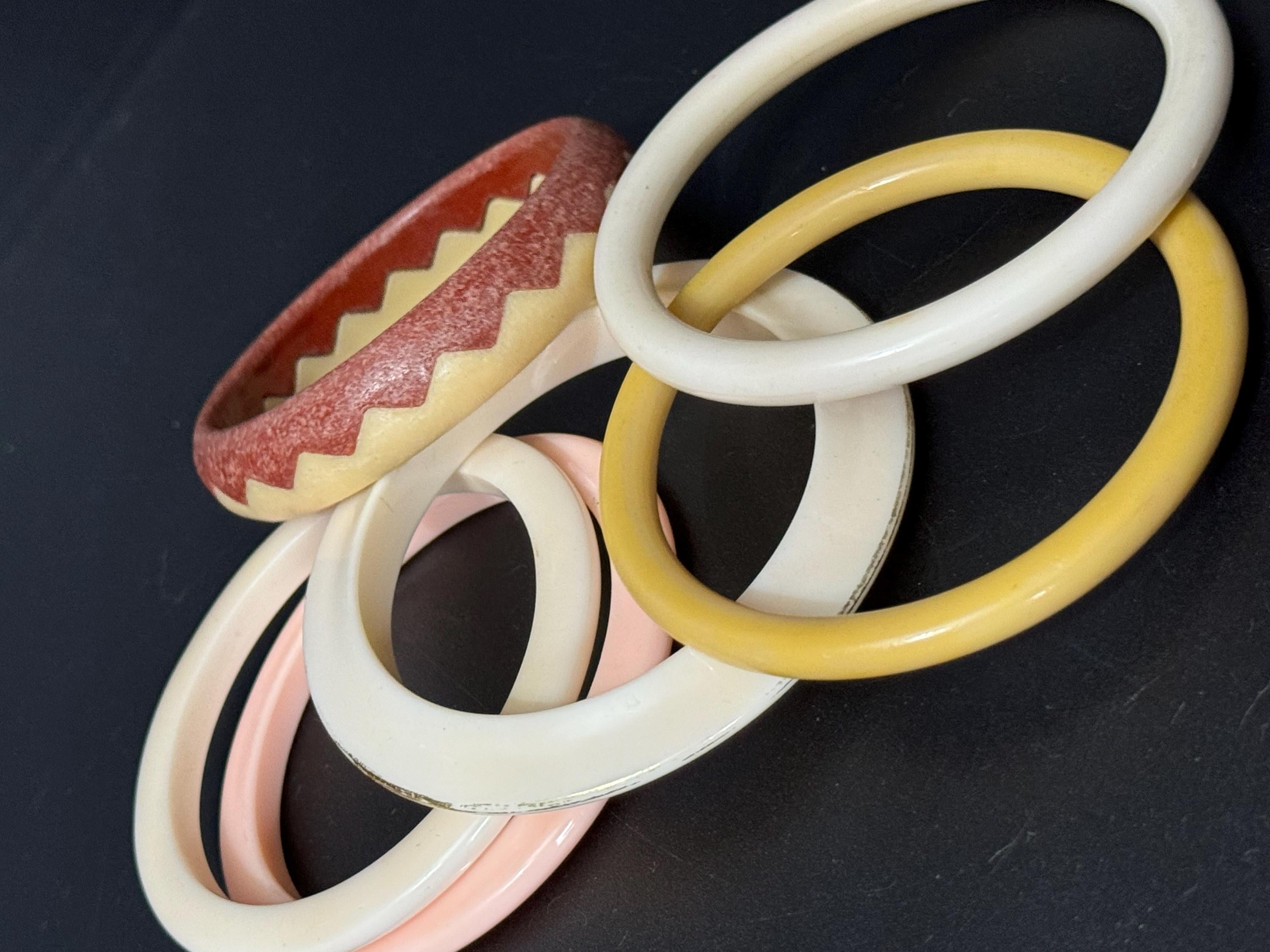 Cream pink brown beige stack of vintage retro plastic bangles