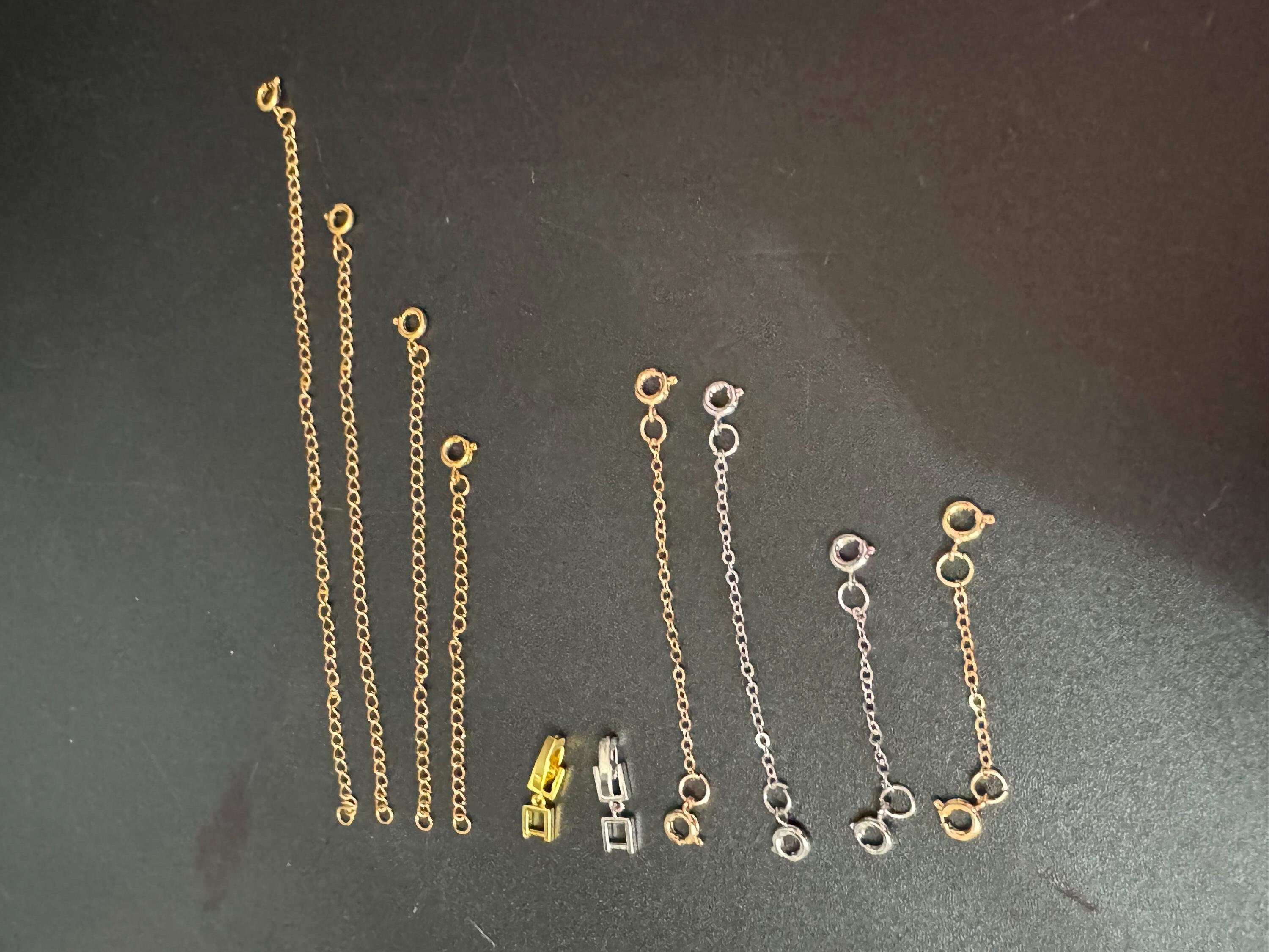 A selection of replacement safety chains for necklaces bangles and bracelets and extender Links