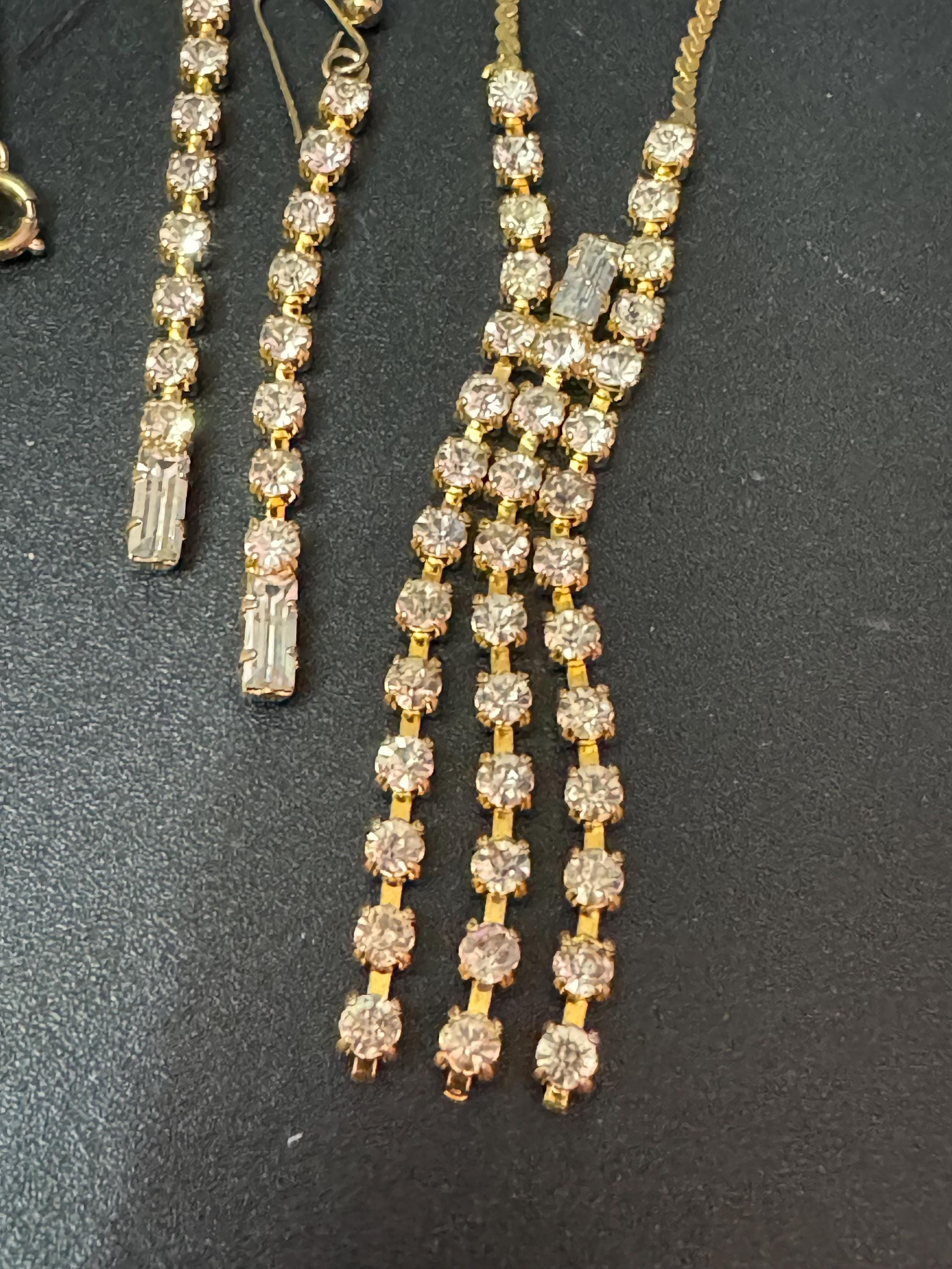 Retro gold tone jewellery set. Necklace long drop pierced dangly earrings clear glass diamanté gold tone metal Demi parure